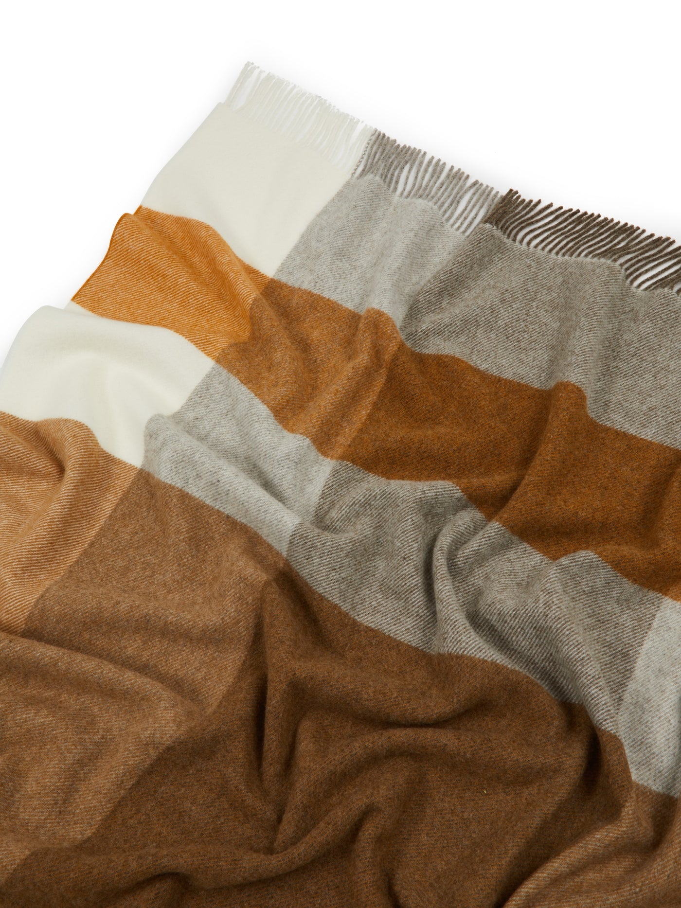 Close-up of Lanerossi Uruguay throw's fringed edge, amber, camel, grey, and ivory check.