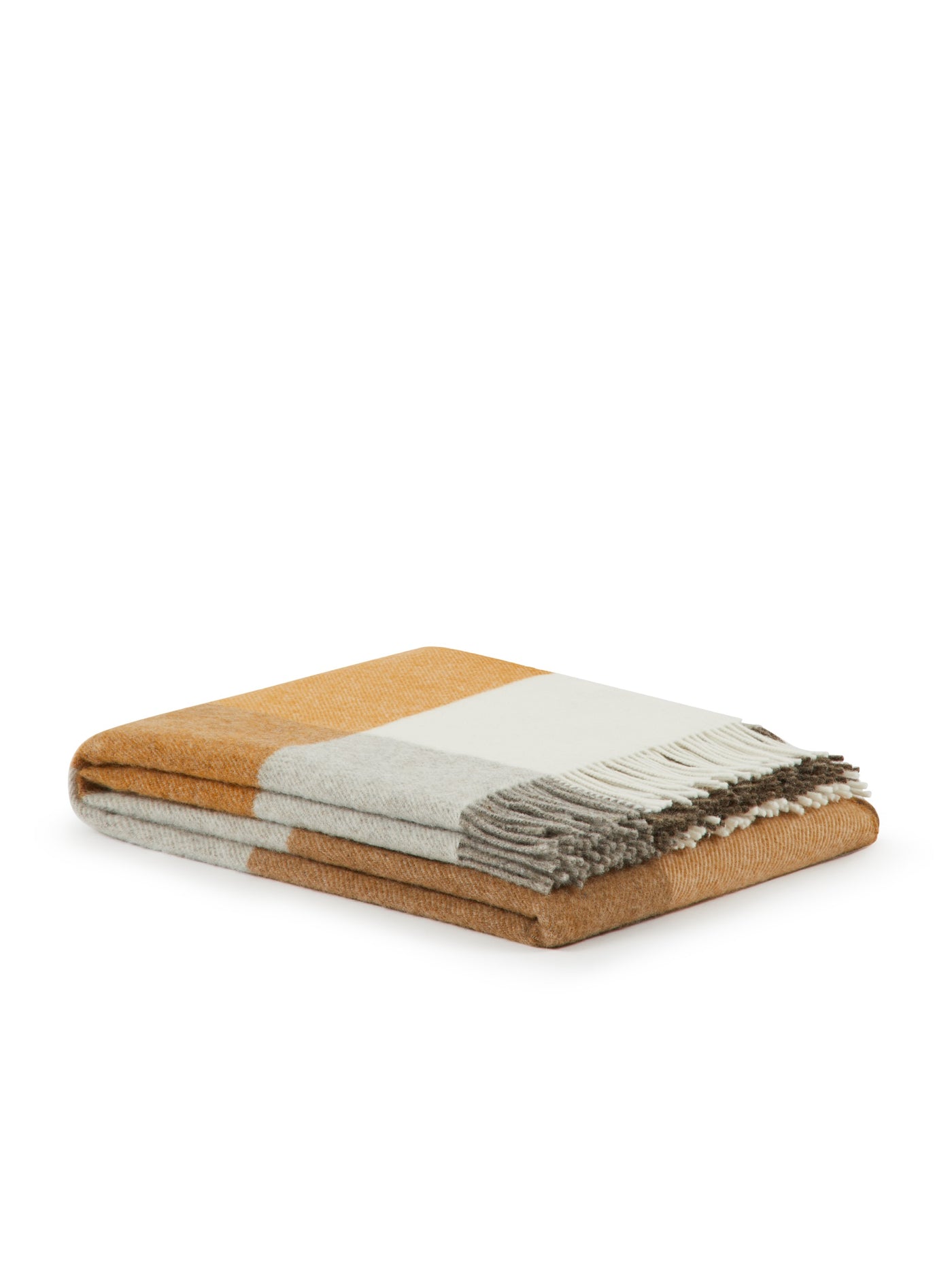 Close-up of folded Lanerossi Uruguay throw in amber and ivory check with fringe trim.