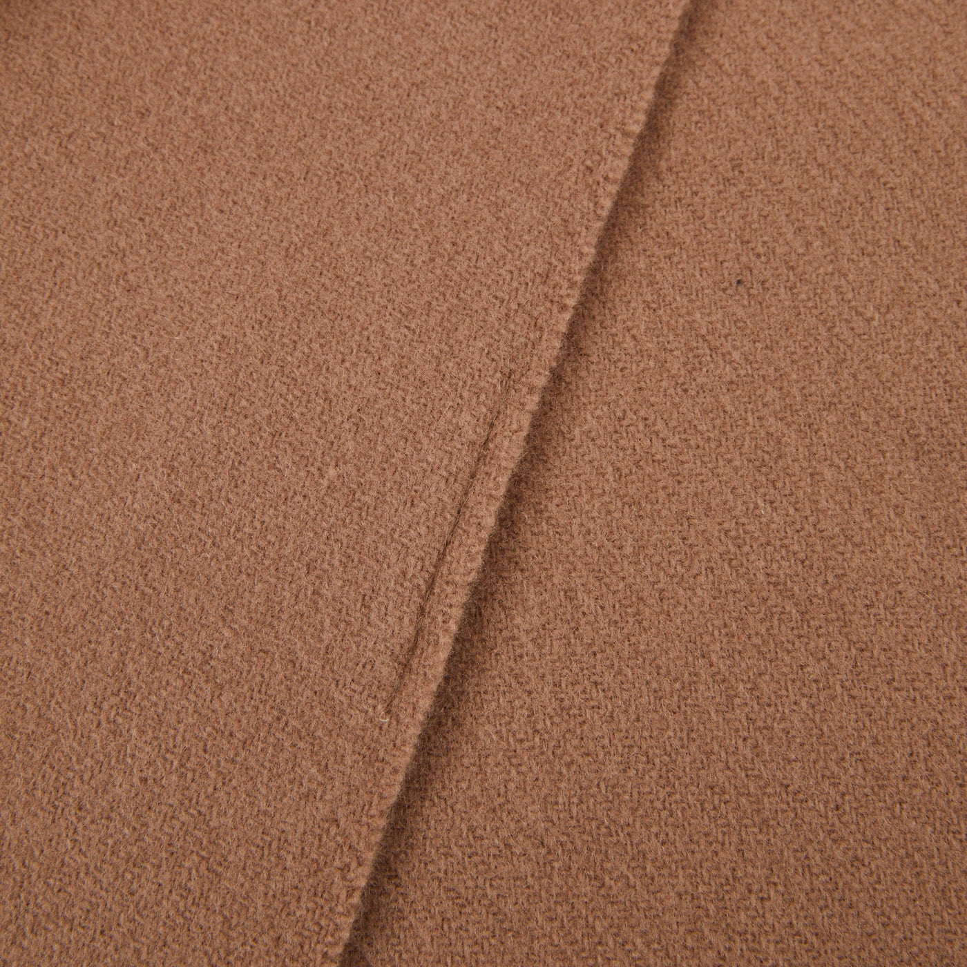 Close-up of Lanerossi Uruguay throw hem, showing camel boucle-textured wool weave.