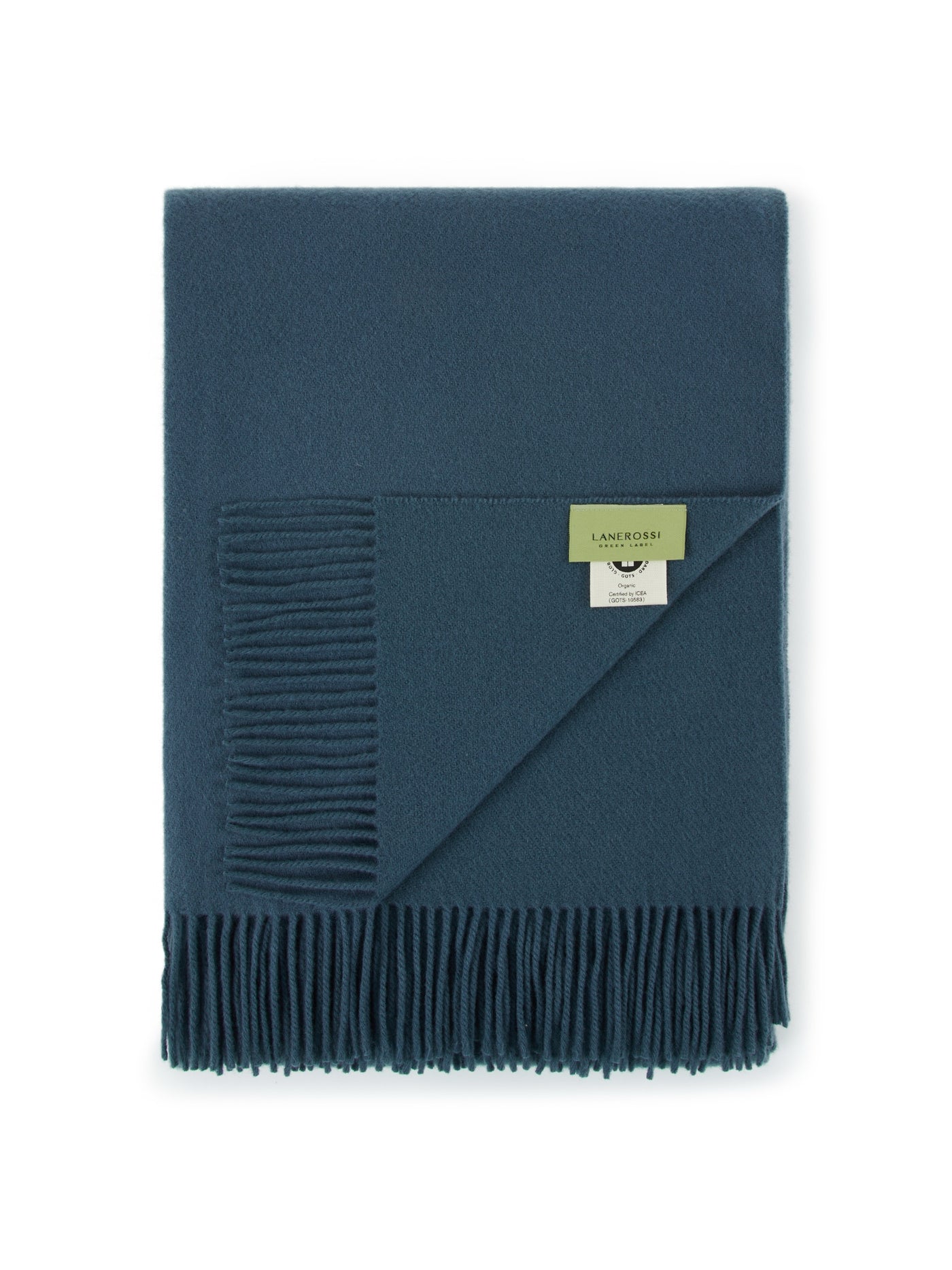 Lanerossi Uruguay GOTS Solid throw in teal, folded with fringe trim detail.