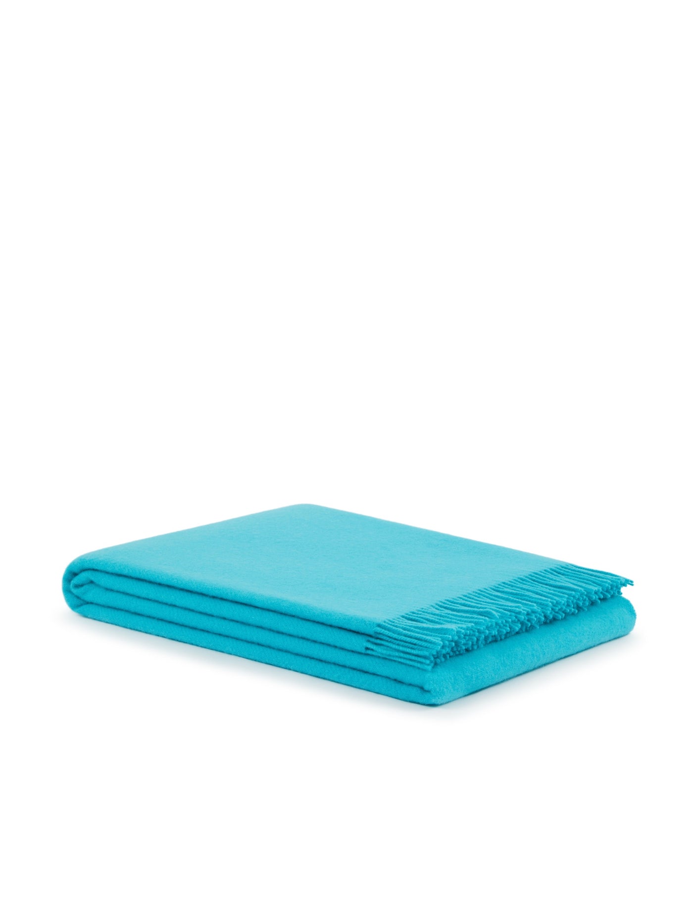Lanerossi Uruguay throw folded neatly, turquoise with fringe trim detail.
