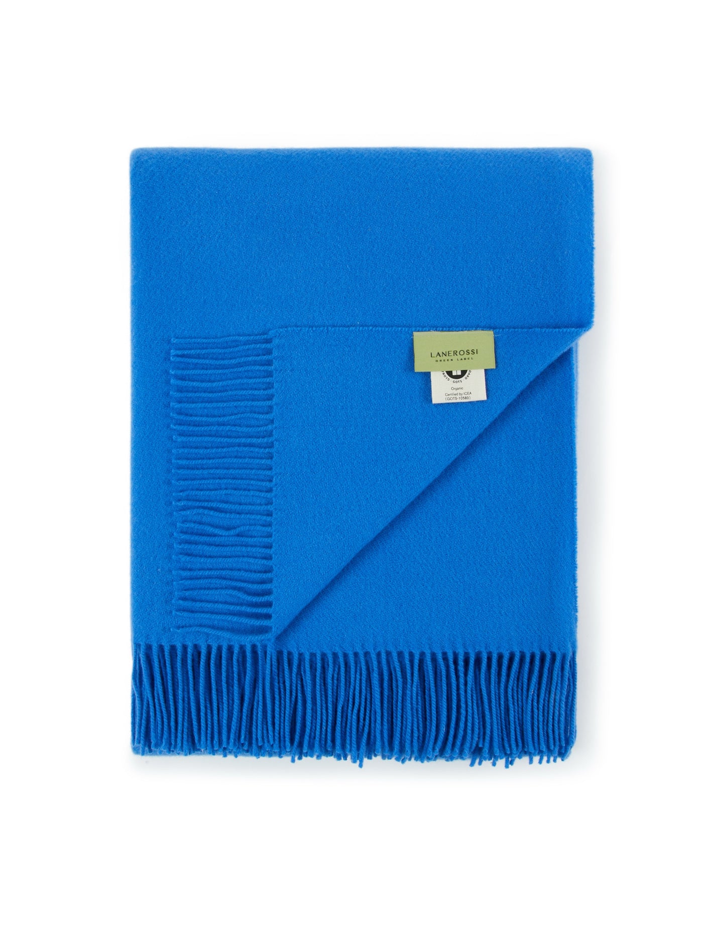 Cobalt blue Lanerossi Uruguay throw folded flat, showing fringe hem and woven label.