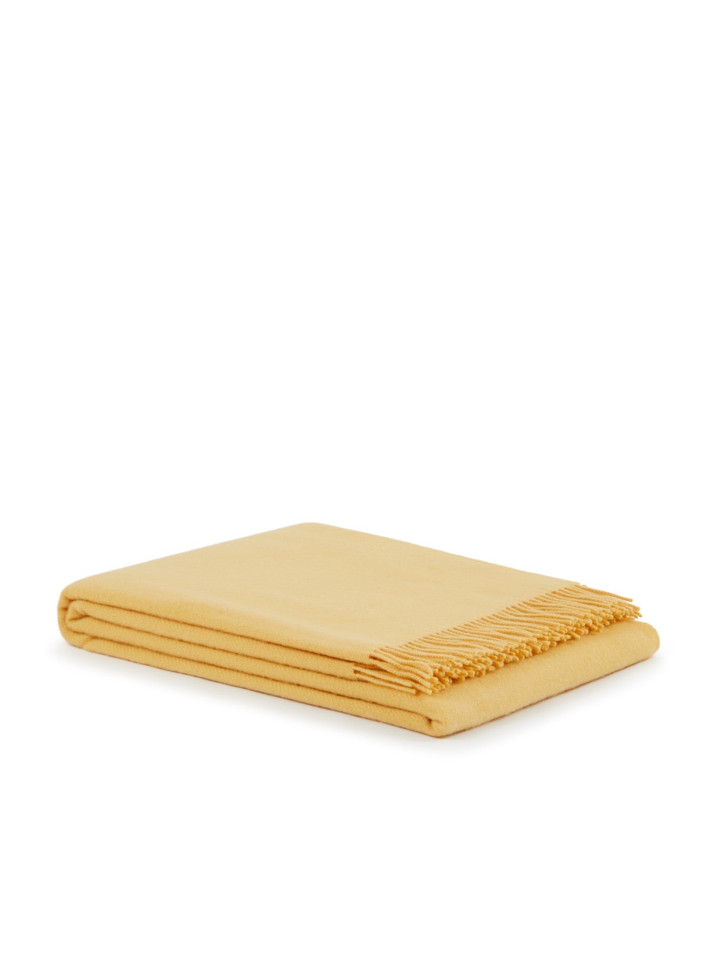 Lanerossi Uruguay throw folded neatly, golden yellow with fringe trim detail.