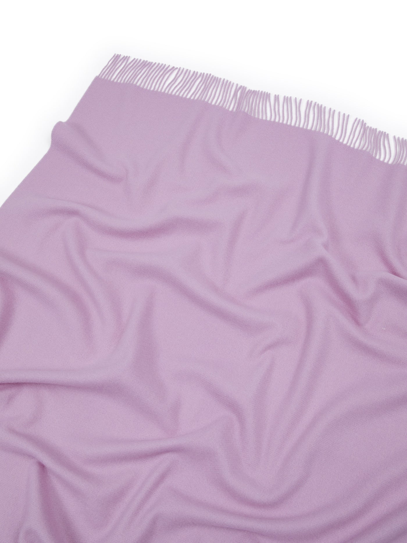 Lavender throw with fringe trim, draped flat to show soft fabric drape and texture.