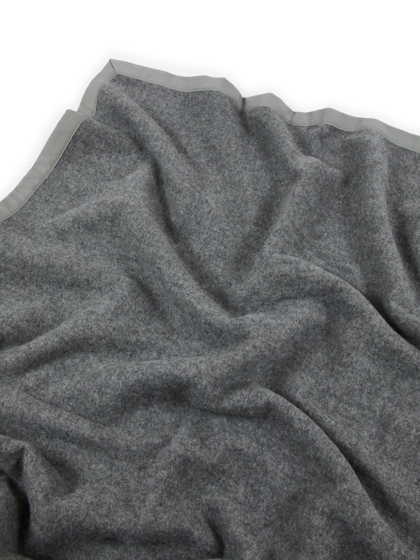 Close-up of Lanerossi Uruguay blanket in heather grey wool with contrast satin border trim.
