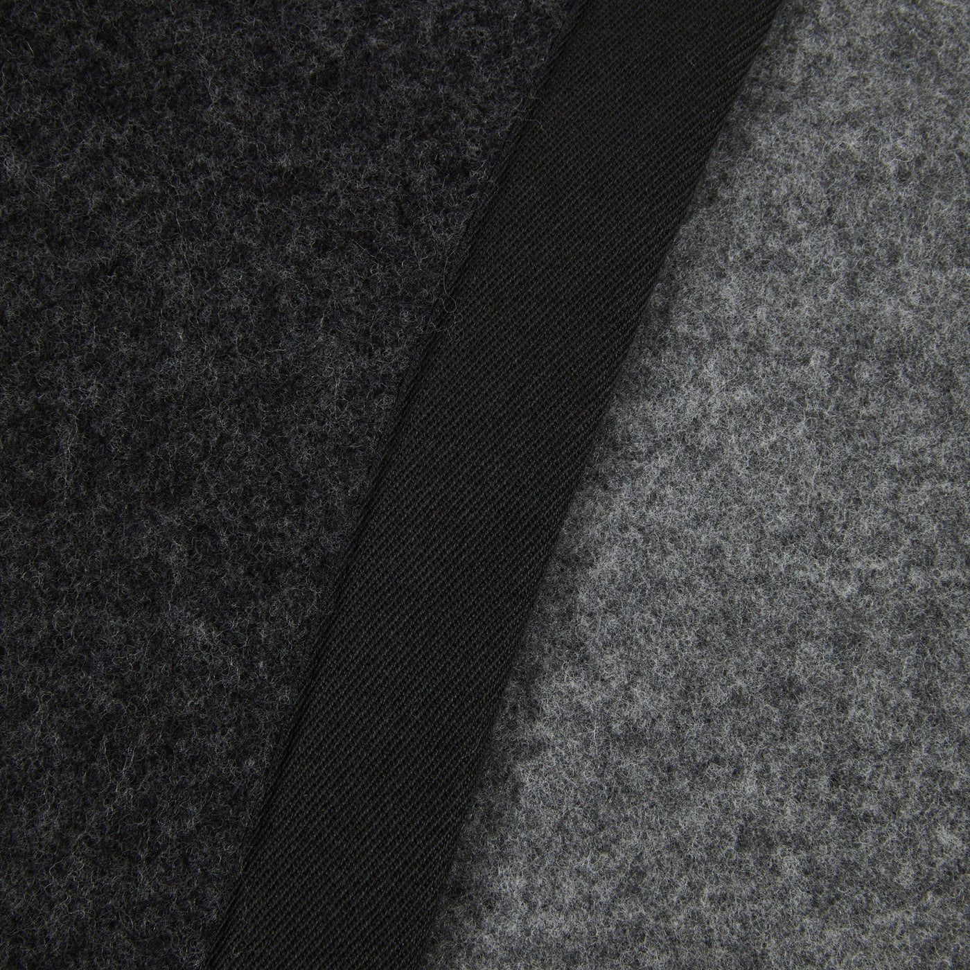 Close-up of Lanerossi Uruguay blanket showing charcoal wool texture and black ribbon trim detail.
