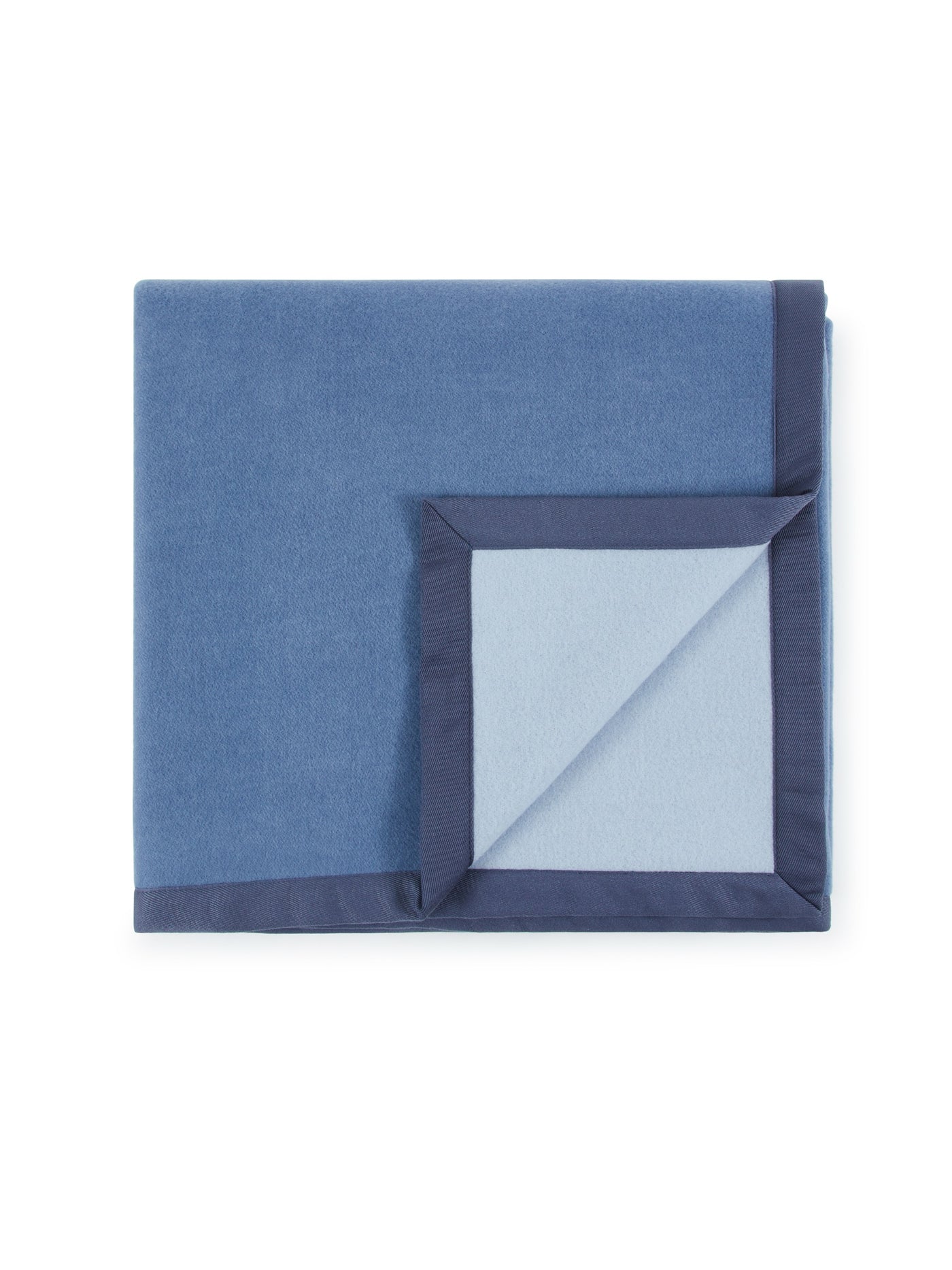 Lanerossi Uruguay blanket folded, showing slate blue face and powder blue reverse with navy border.
