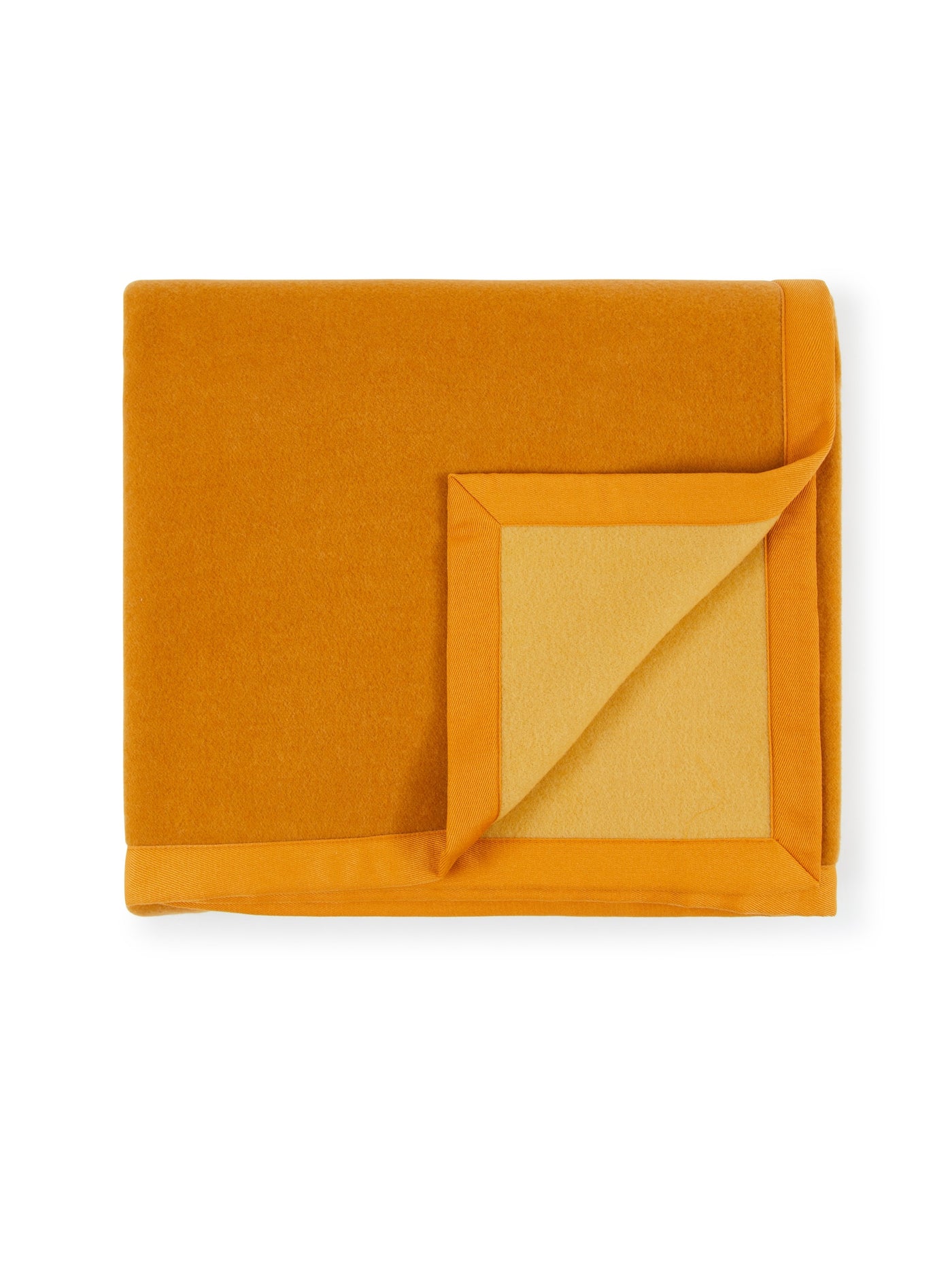 Corner fold detail revealing saffron reverse on Lanerossi Uruguay wool blanket.