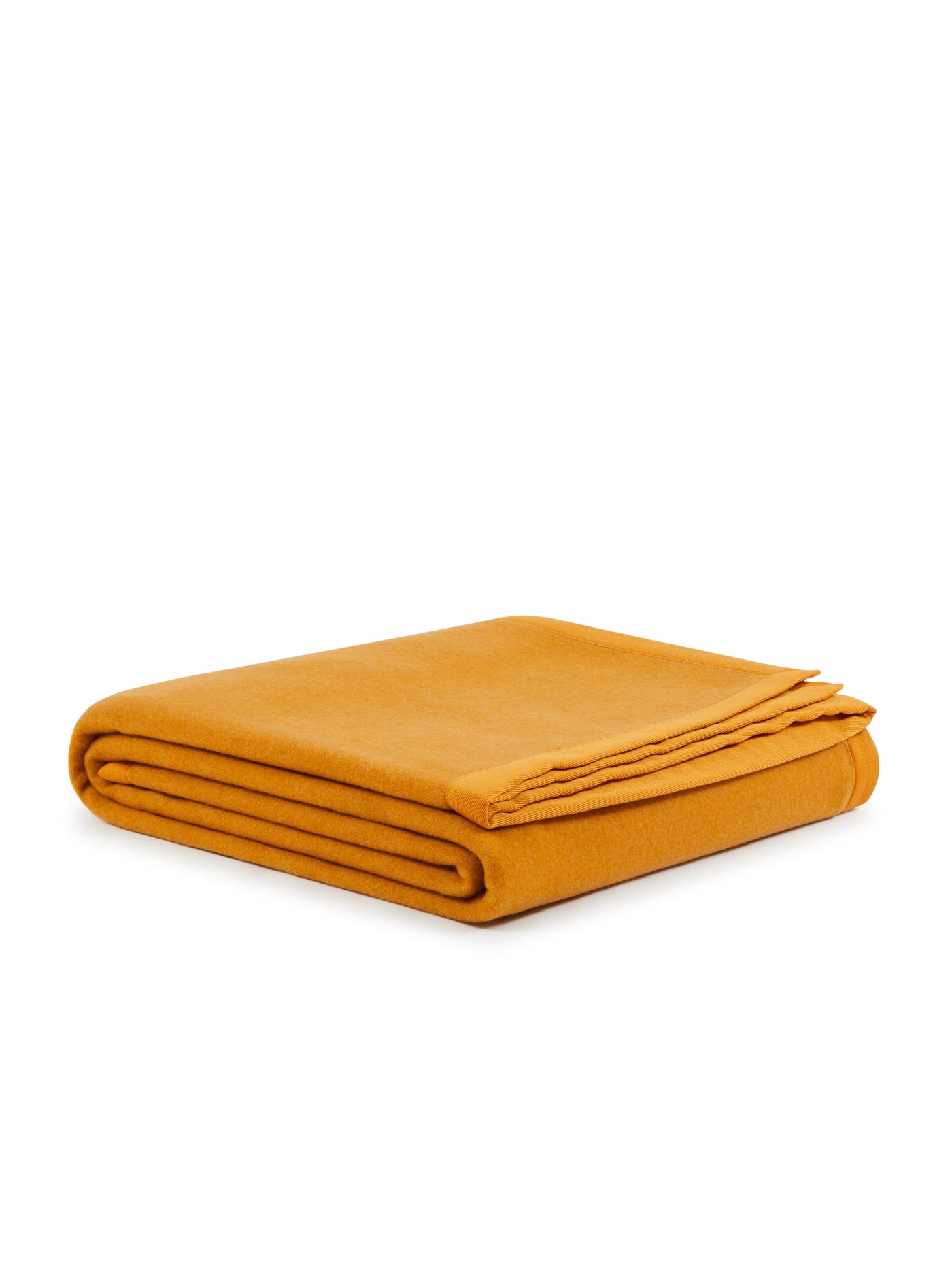 Lanerossi Uruguay blanket folded flat, saffron wool with clean-stitched edge detail.
