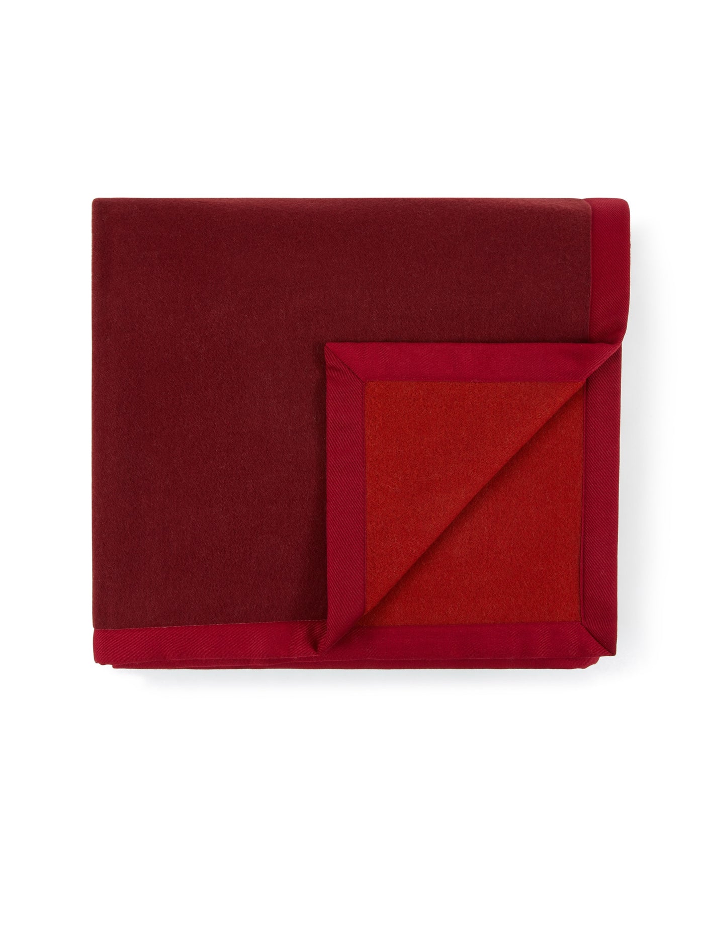 Lanerossi Uruguay blanket folded, showing burgundy face and scarlet border detail.