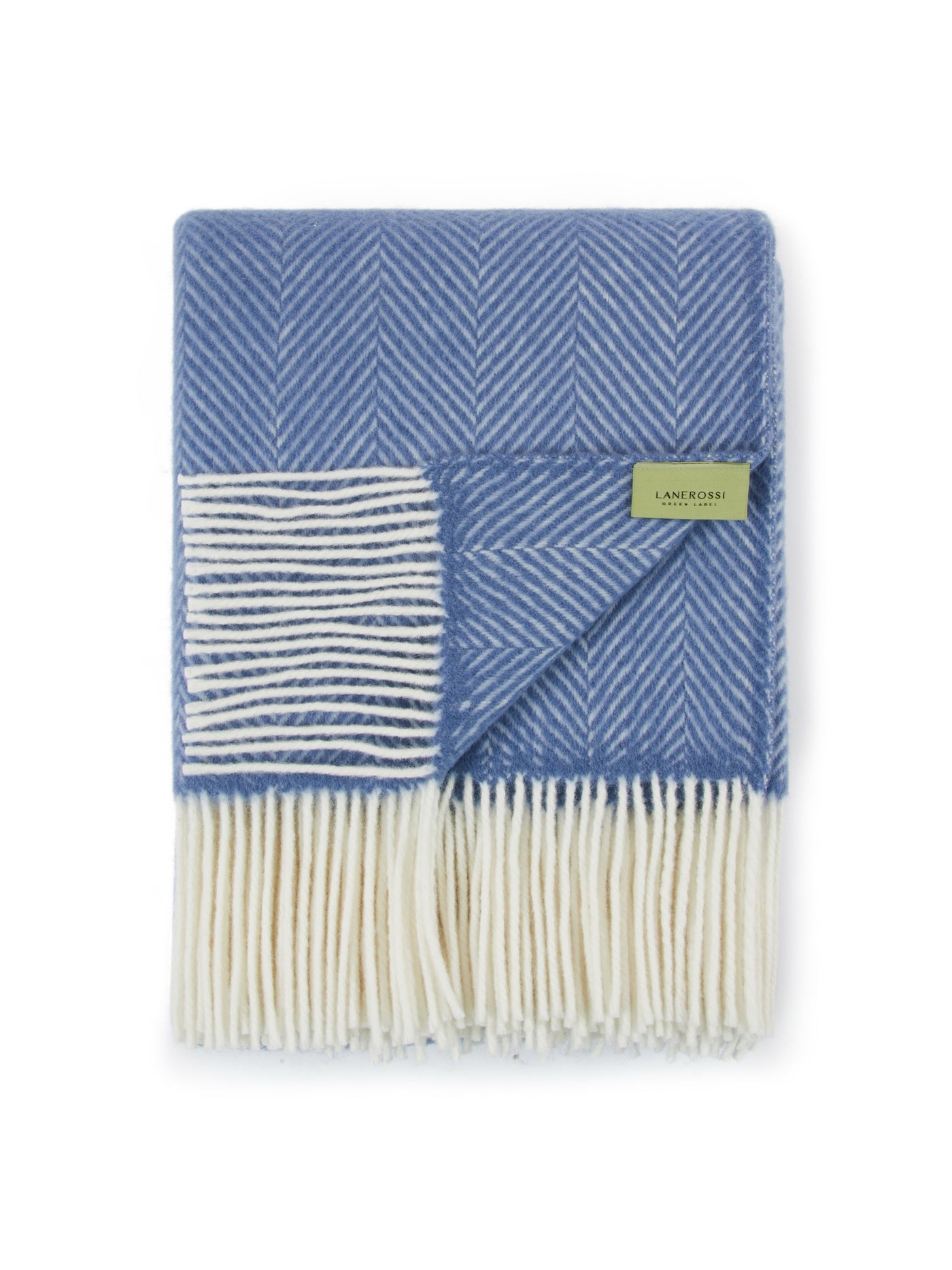 Lanerossi Uruguay throw folded to show blue herringbone pattern and ivory fringe detail.