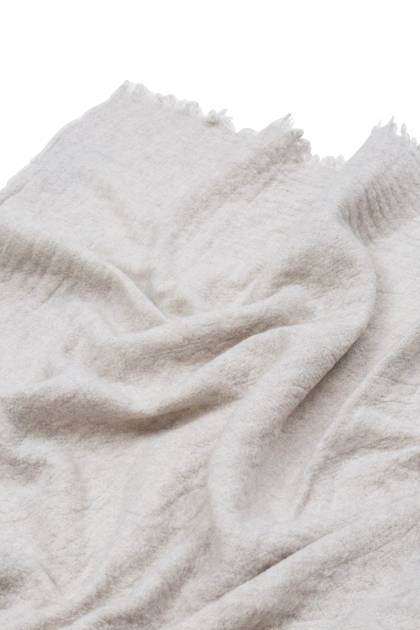 Close-up of Lanerossi Venere blanket in ivory, showing soft brushed texture and fringe edge.
