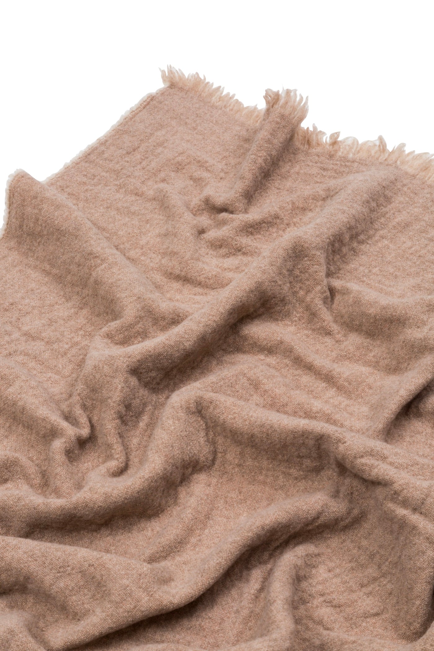 Close-up of Lanerossi Venere blanket in blush, showing fluffy texture and fringe edge.