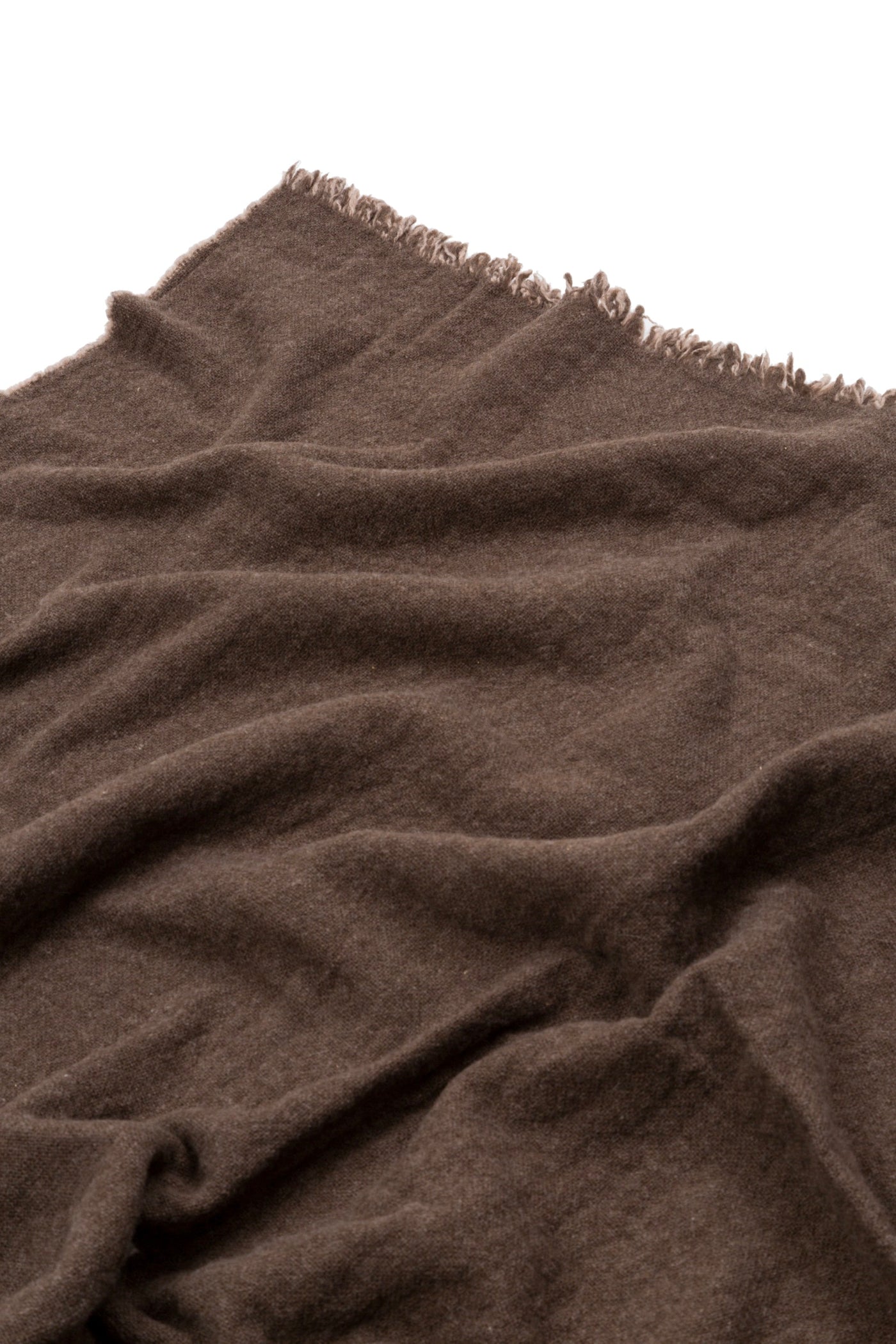 Close-up of Lanerossi Venere blanket in warm brown with fringe edge detail.