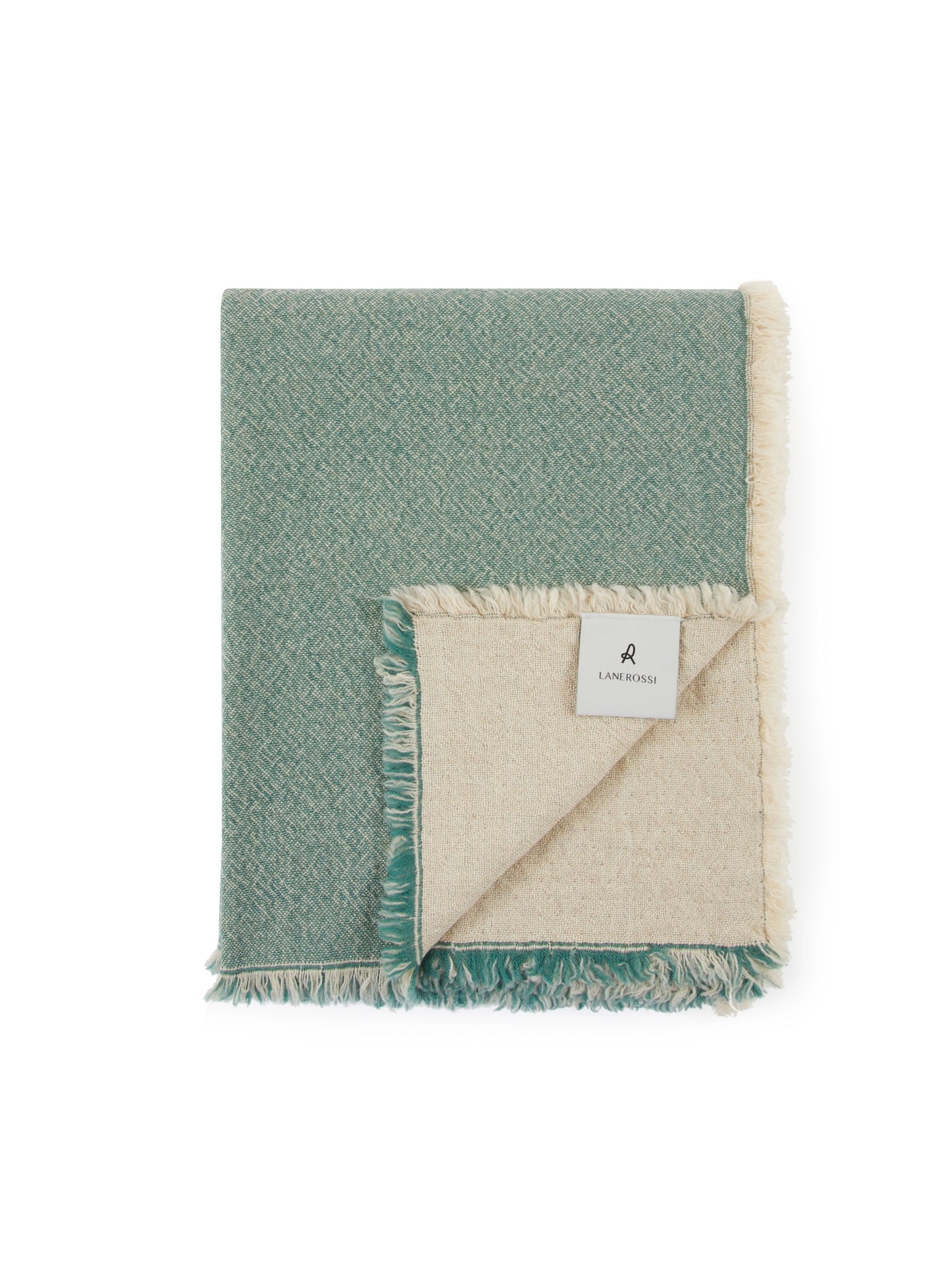 Lanerossi Zebio throw folded to reveal sage and natural reversible sides with fringe trim.