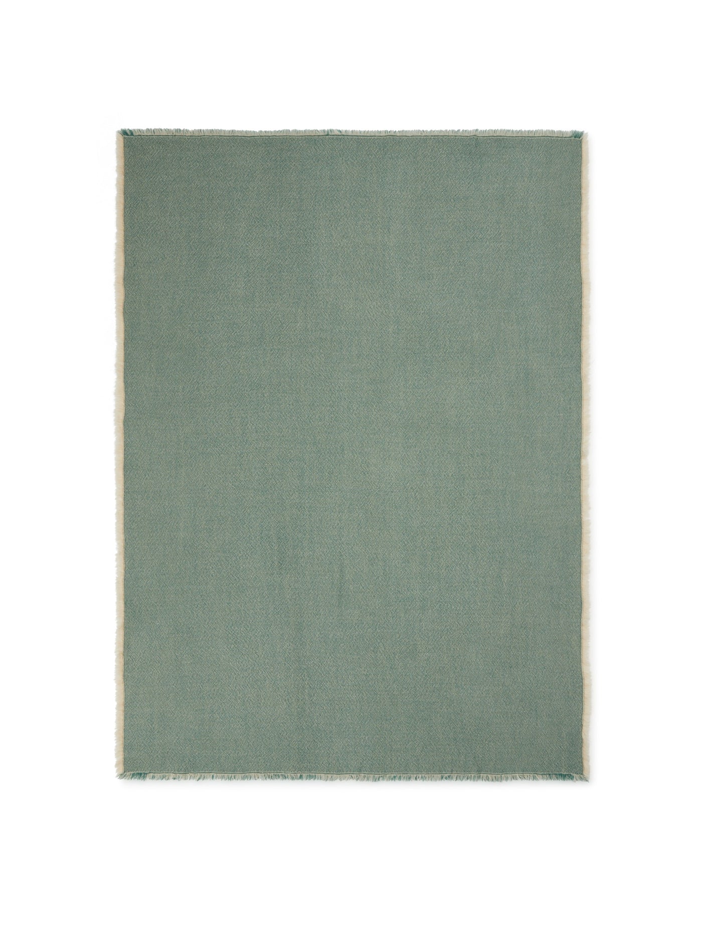 Sage green throw with frayed edges, flat lay view.