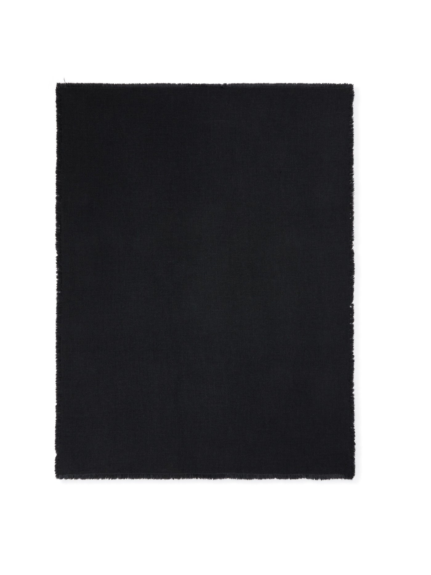 Lanerossi Zebio throw in black with frayed edges, flat lay on white background.