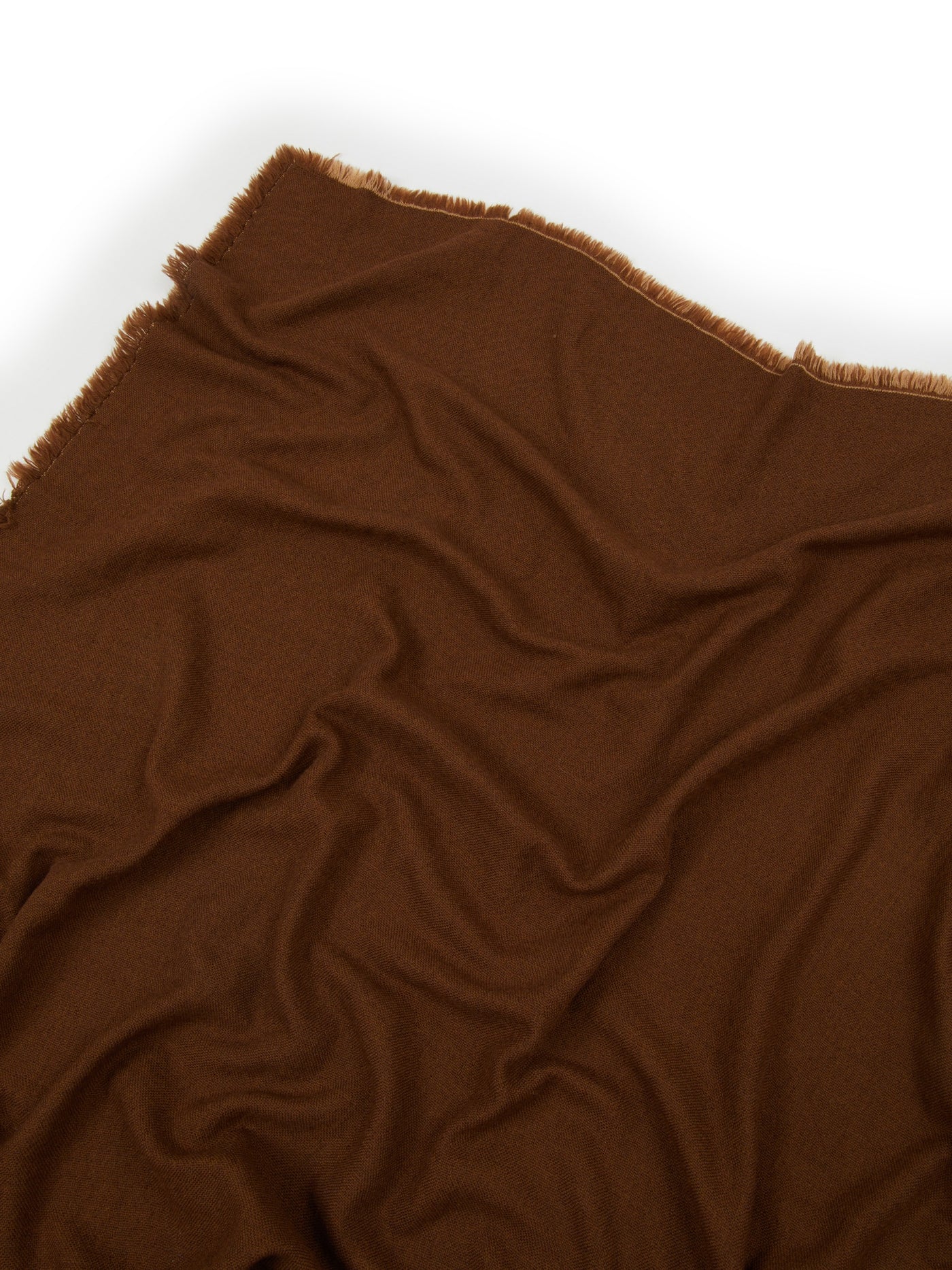 Close-up of Lanerossi Zebio throw in chestnut brown with fringe trim edge detail.