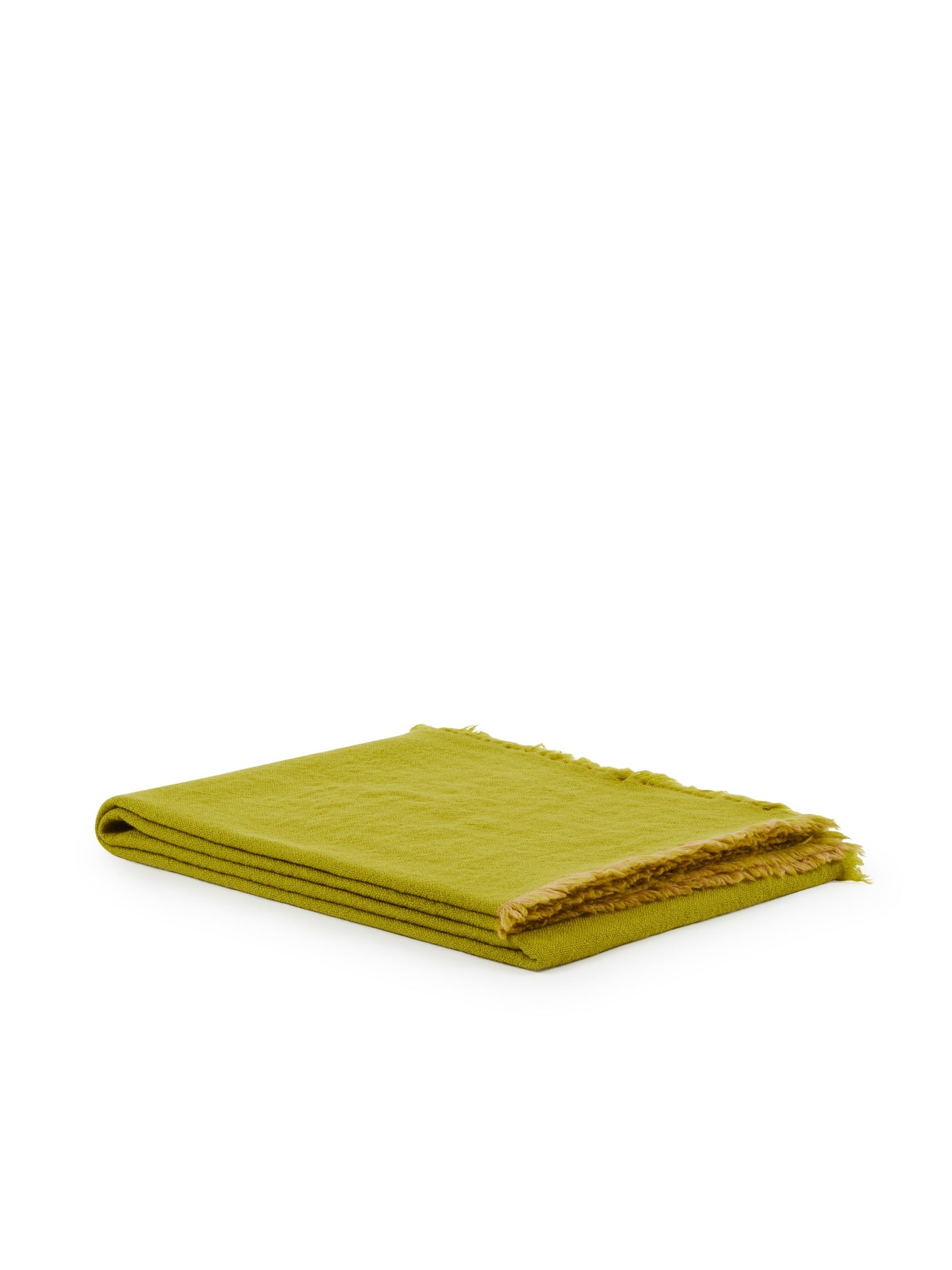 Folded chartreuse throw with frayed fringe edge detail.