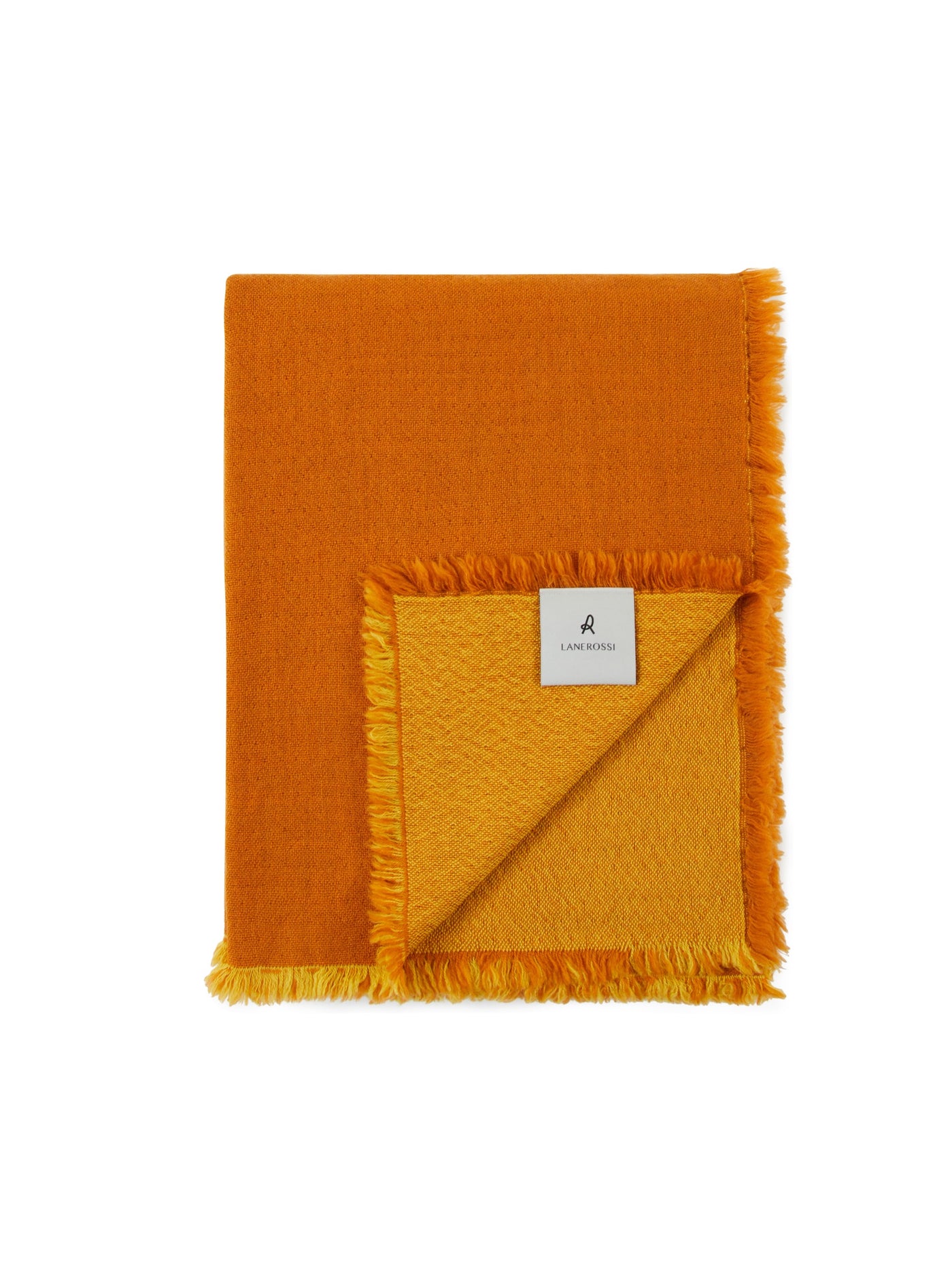 Lanerossi Zebio throw folded to reveal saffron reverse side and fringe trim.