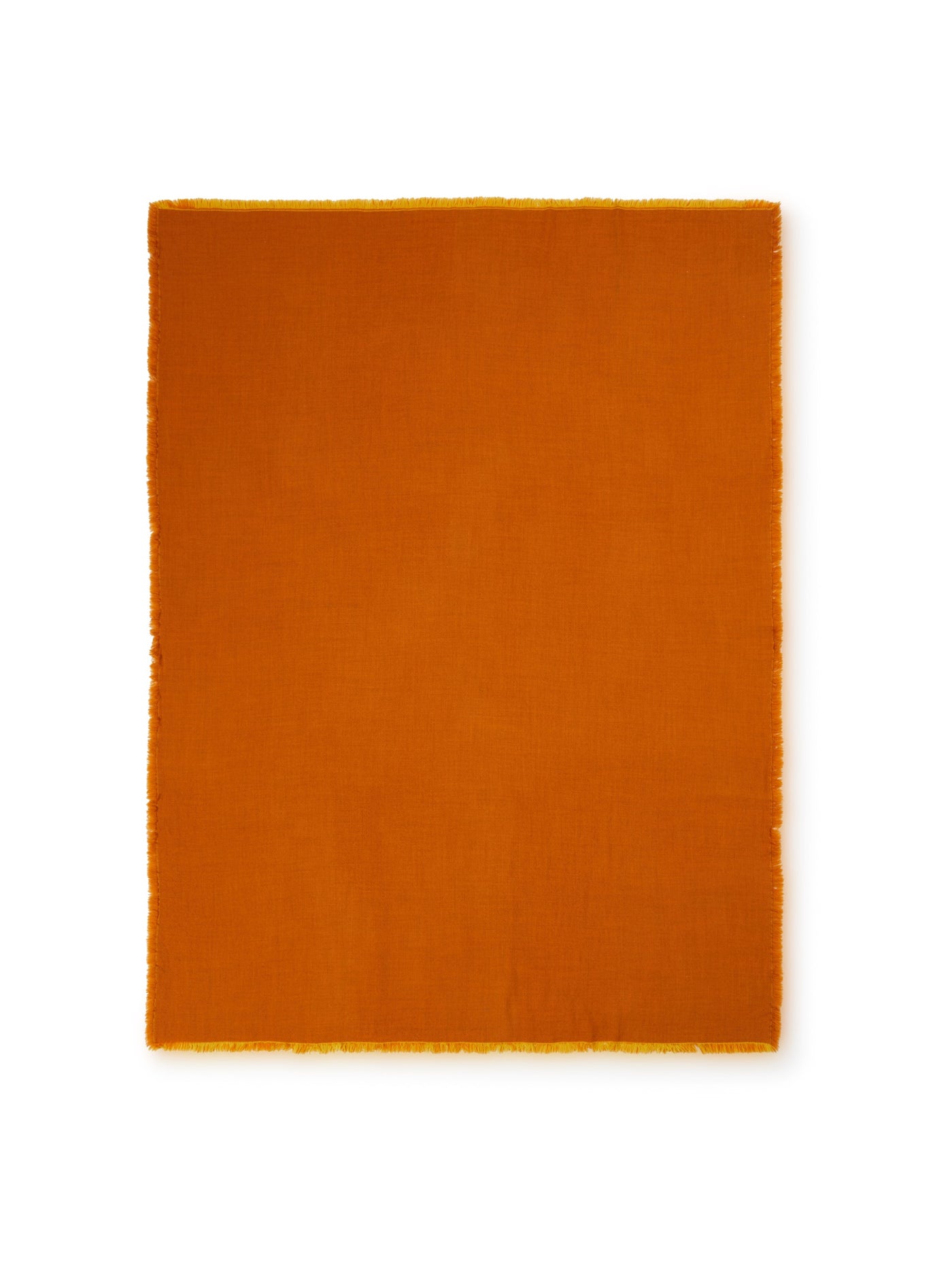 Lanerossi Zebio throw in burnt orange with fringed yellow border edge detail.
