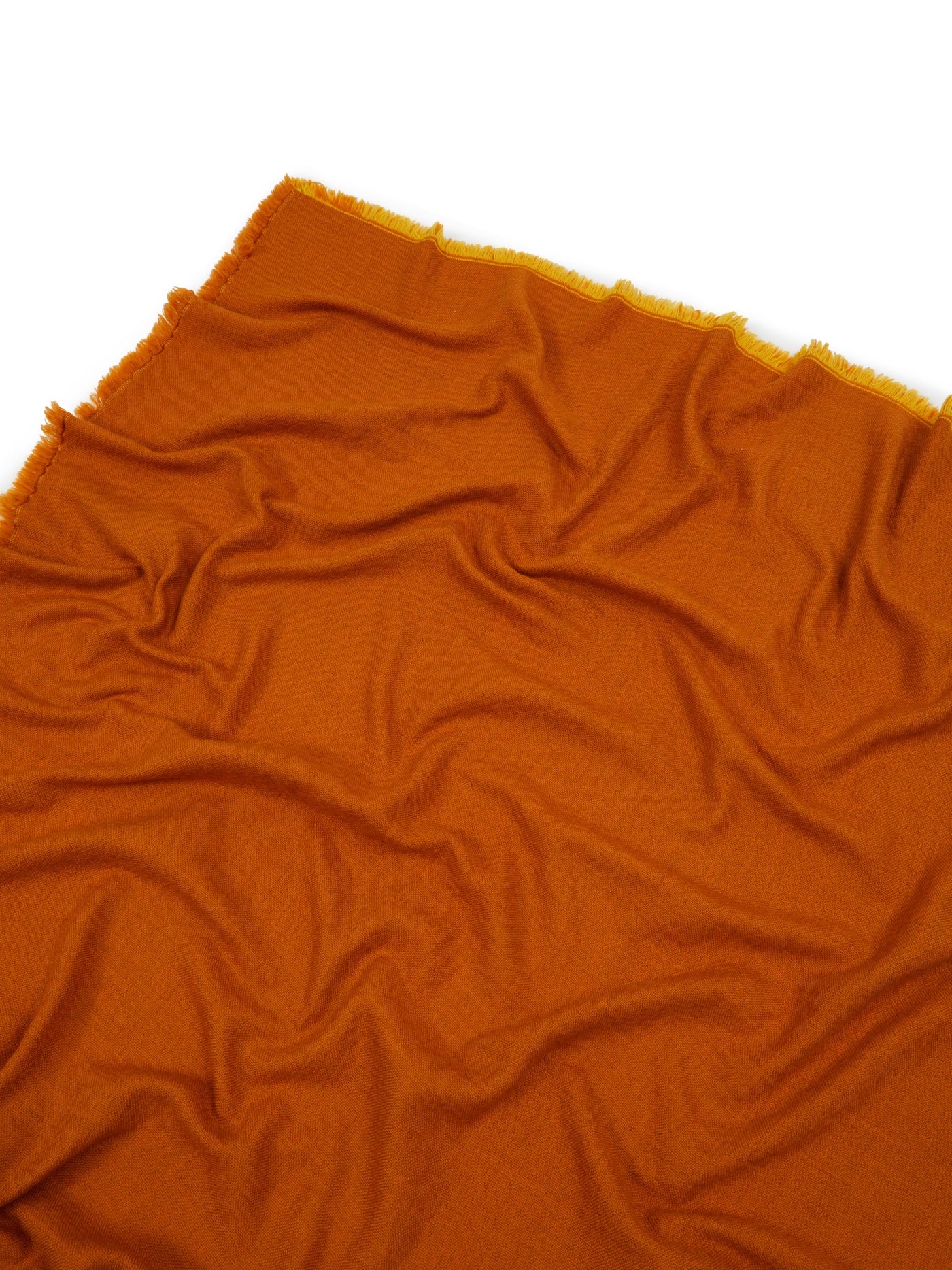 Close-up of Lanerossi Zebio throw in amber with fringe edge detail.
