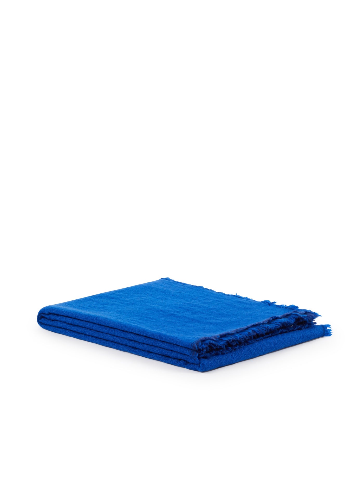 Lanerossi Zebio throw folded, cobalt blue with fringe trim detail.