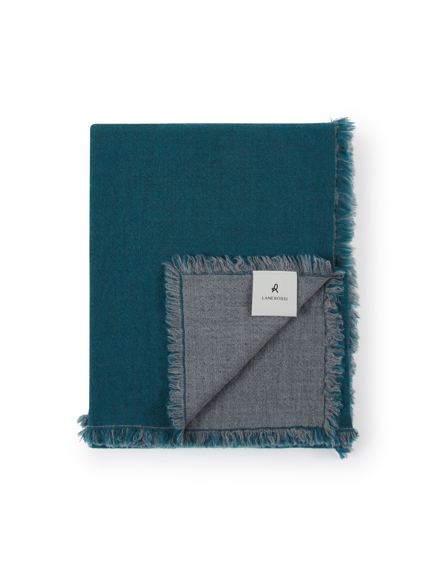 Teal and grey reversible Lanerossi Zebio throw, folded flat showing fringe trim.