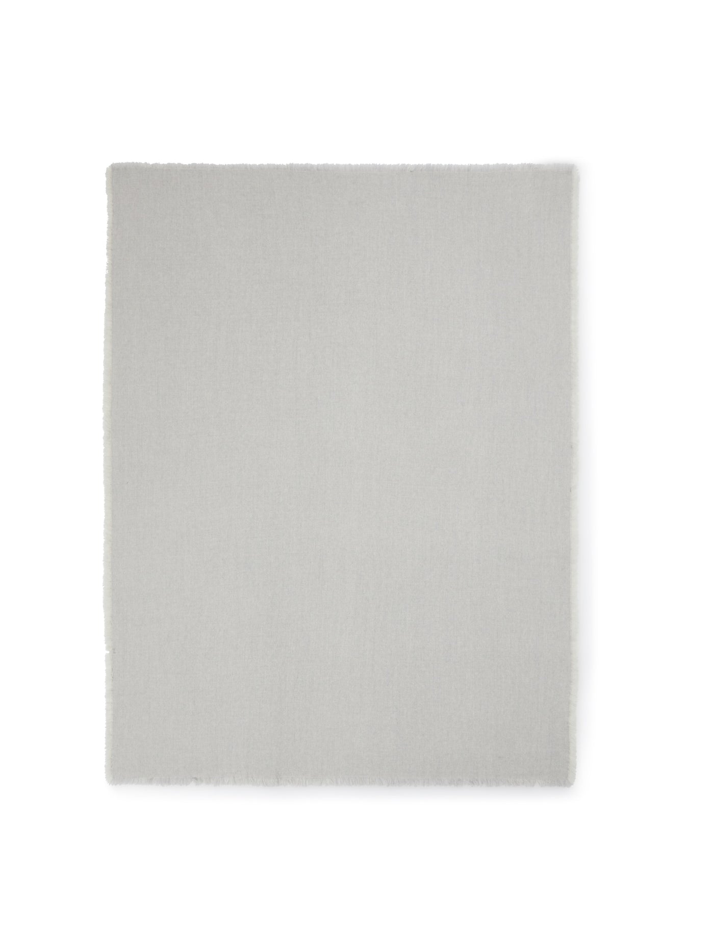Lanerossi Zebio throw in silver-grey, flat lay showing frayed edge trim detail.