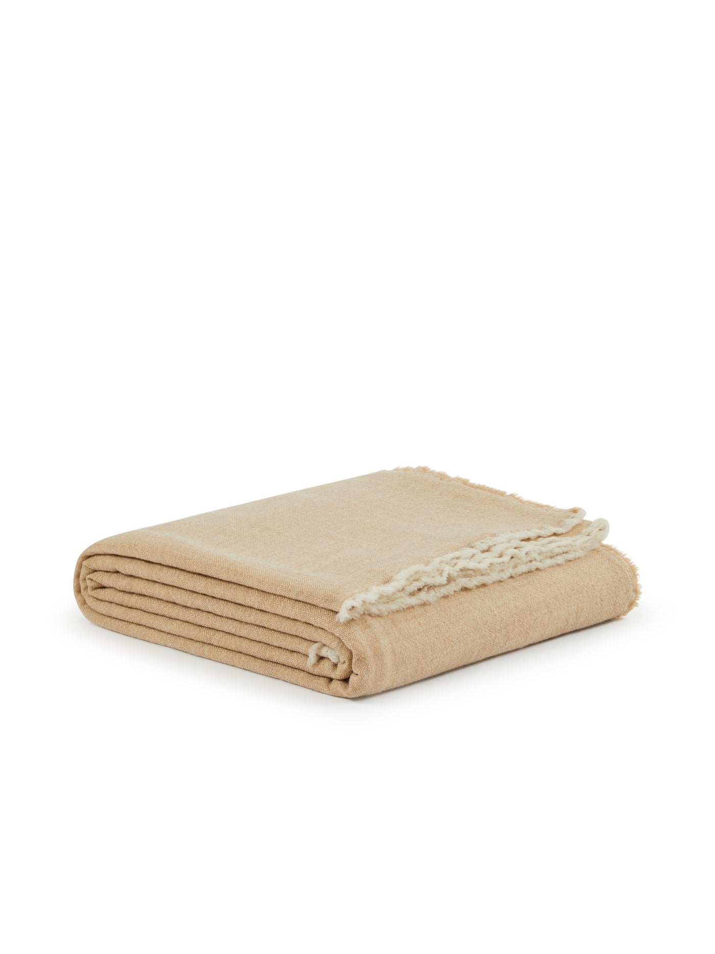 Lanerossi Zebio blanket folded in camel, showing ivory fringe trim detail.