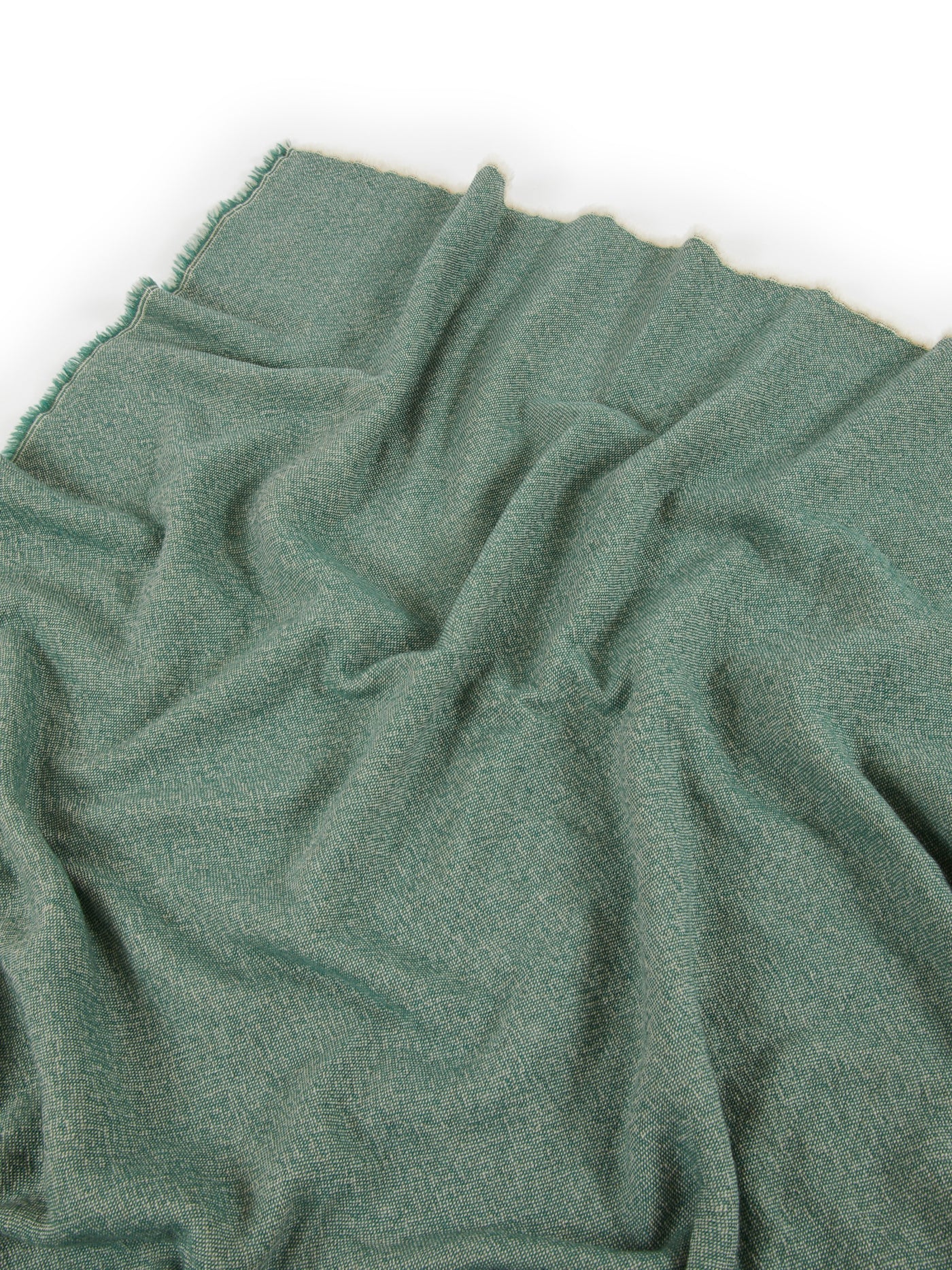 Lanerossi Zebio blanket in sage green, draped to show fringe edge and soft boiled wool texture.