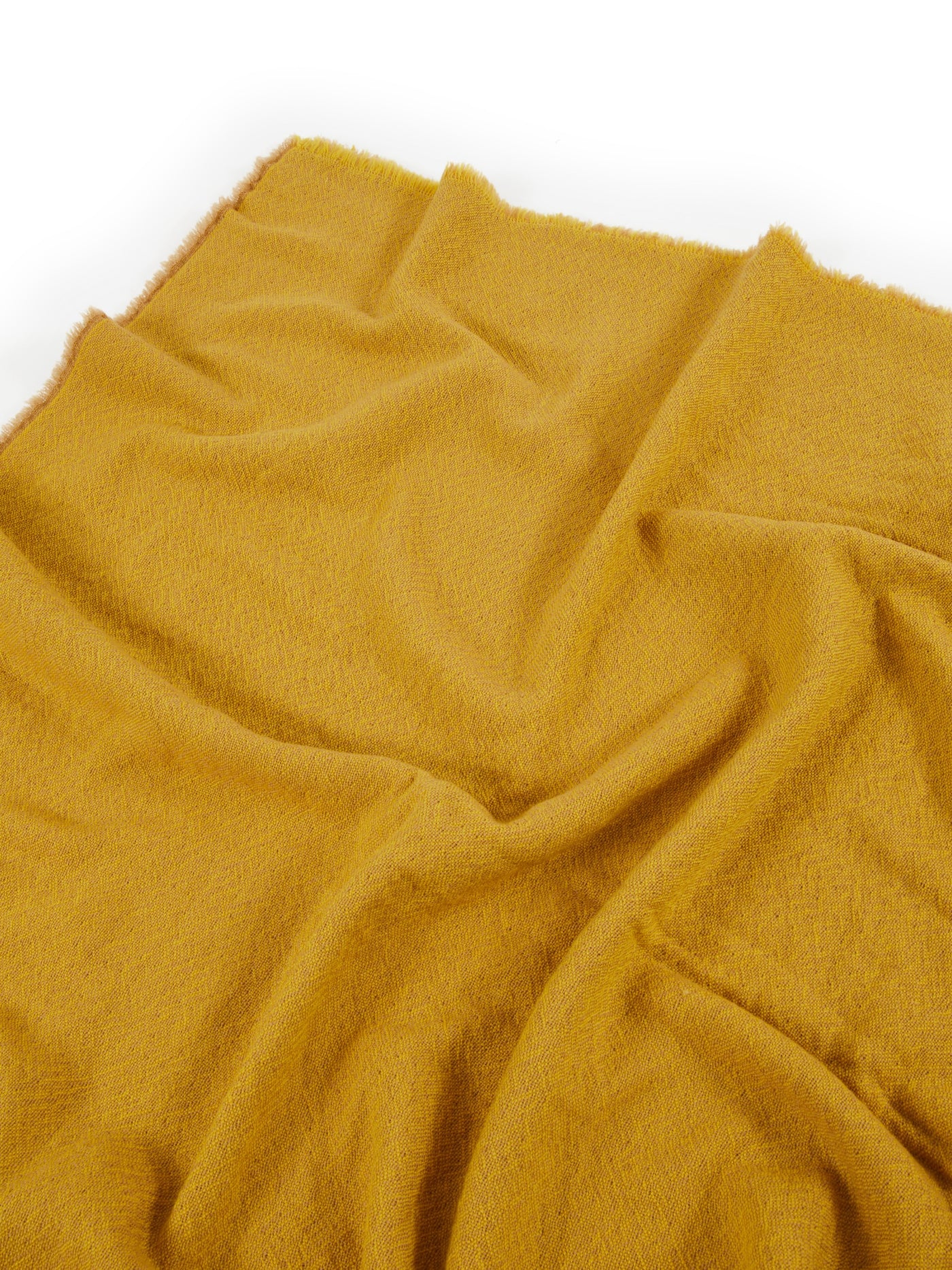 Lanerossi Zebio blanket in mustard yellow, draped to show fluffy boucle texture.