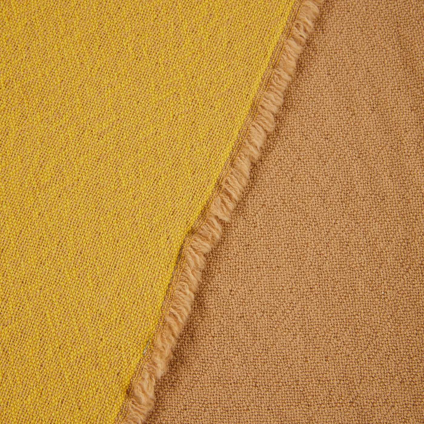 Close-up of Lanerossi Zebio blanket showing mustard and camel reversible weave with fringe edge.