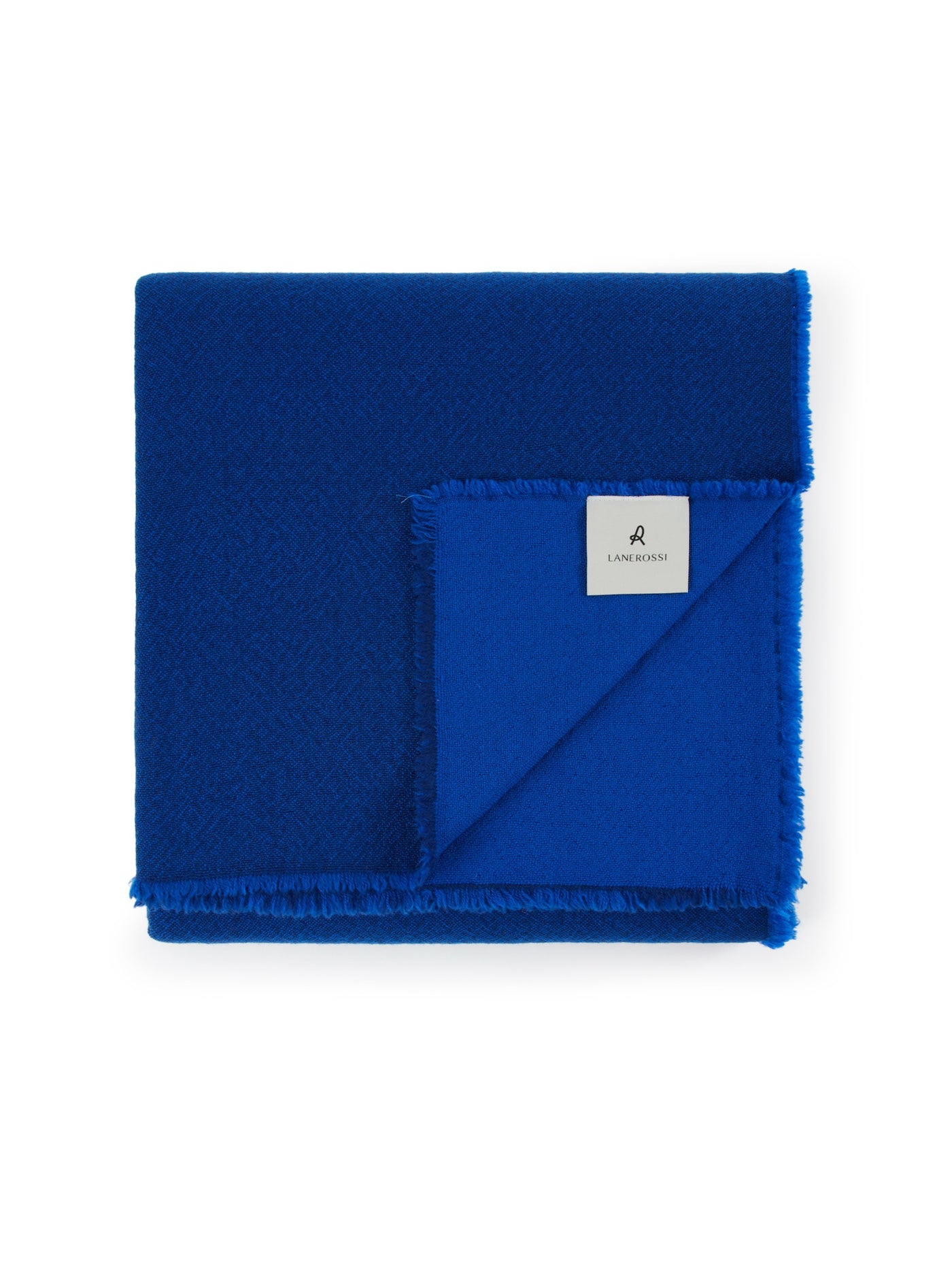Lanerossi Zebio blanket folded, showing cobalt blue weave texture and fringe trim detail.