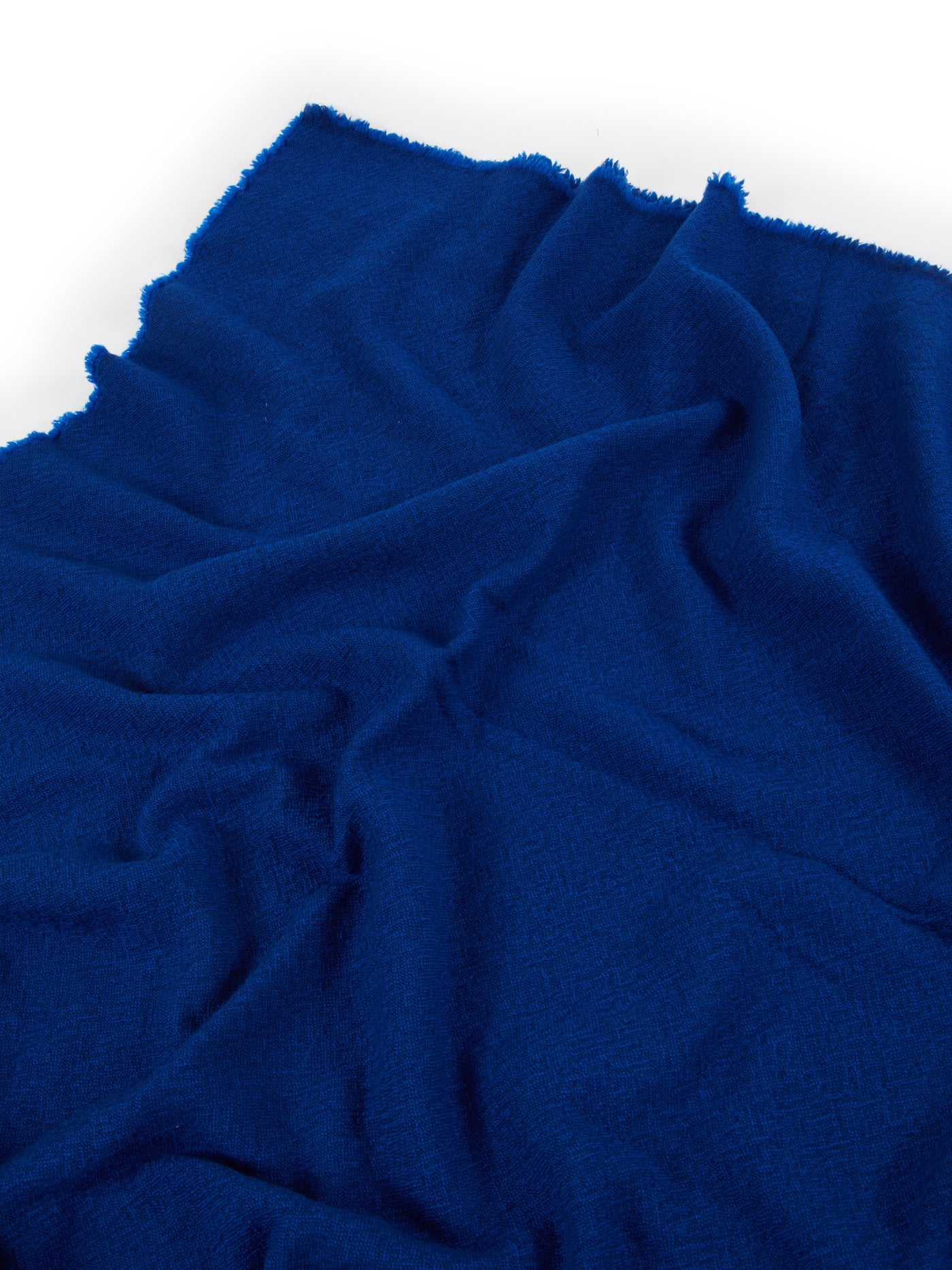 Close-up of Lanerossi Zebio blanket in cobalt, showing fringe edge and boucle texture.