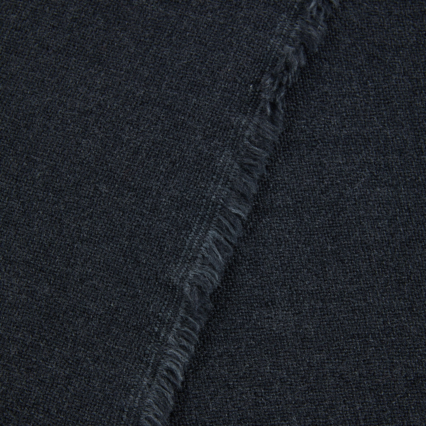 Close-up of Lanerossi Zebio blanket in charcoal, showing fringe edge detail and woven texture.