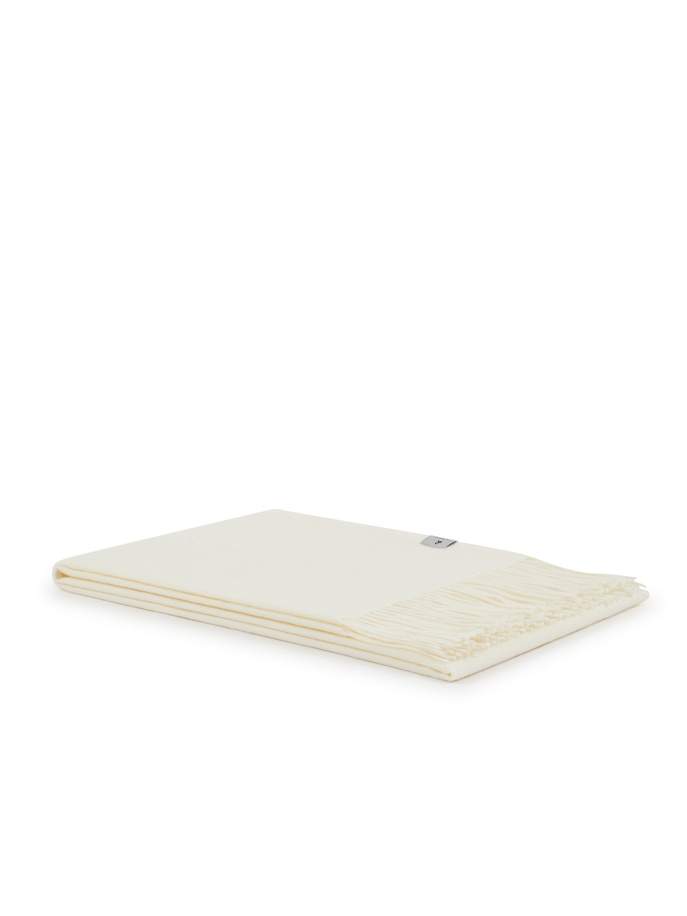 Lanerossi Alashan throw folded flat, ivory with fringe trim, small brand label visible.
