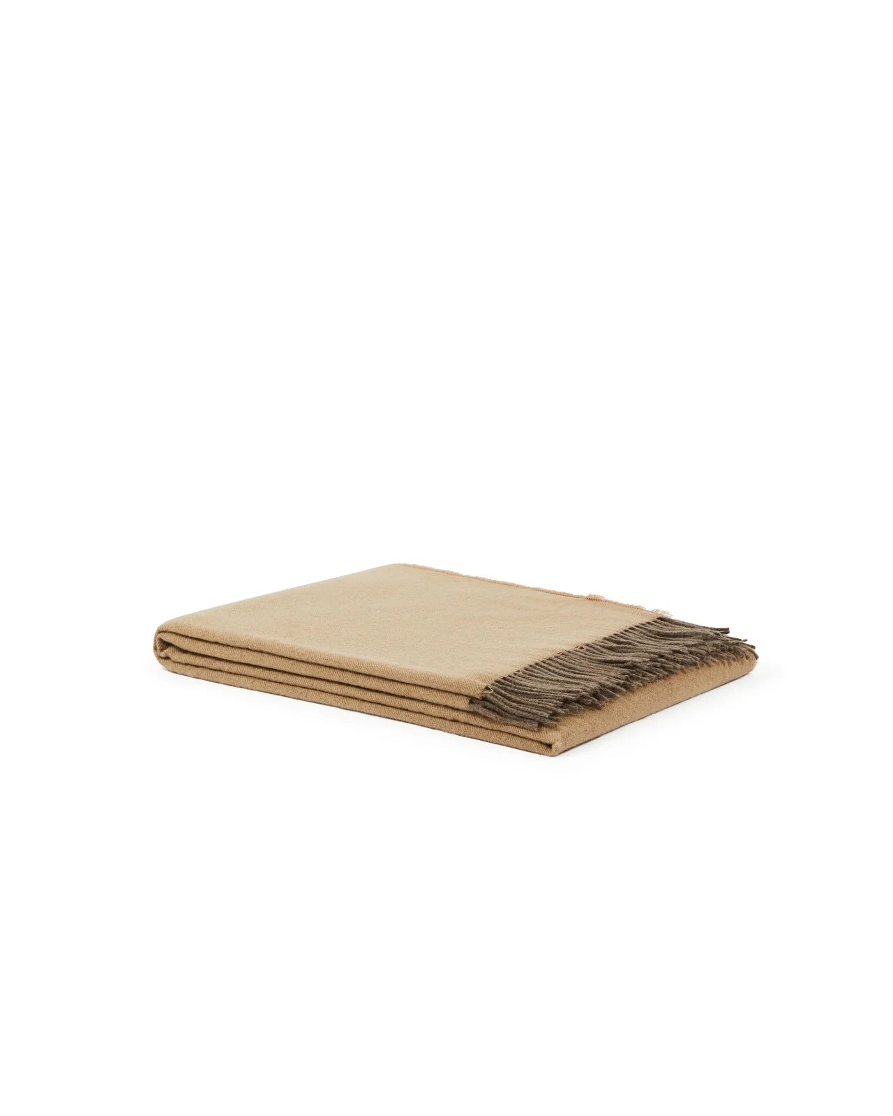 Folded camel throw with contrasting taupe fringe trim along one edge.