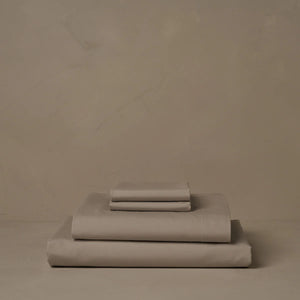 Photo of the Retiring Classic Percale | Sheet Set ensemble.