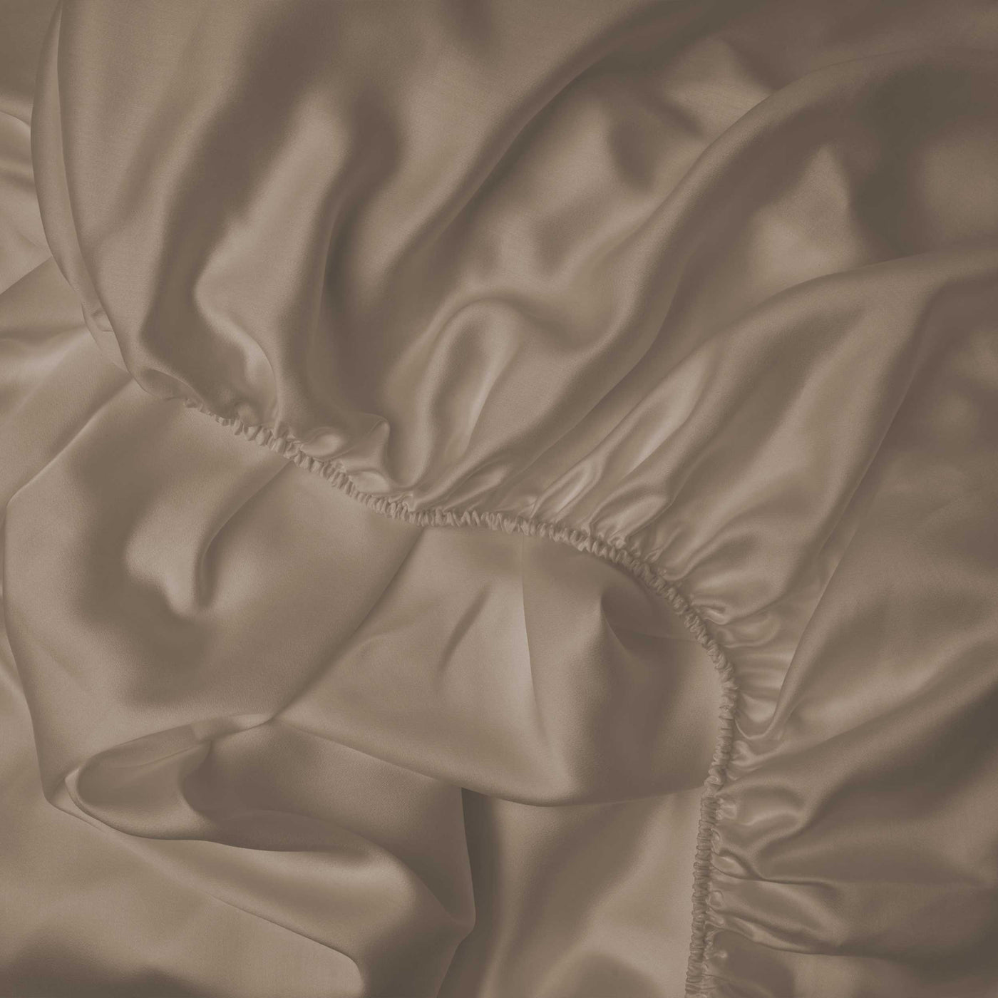 Smooth and silky LETTO Woodland Silk beechwood modal fitted sheet in color candlelight, made in Italy.