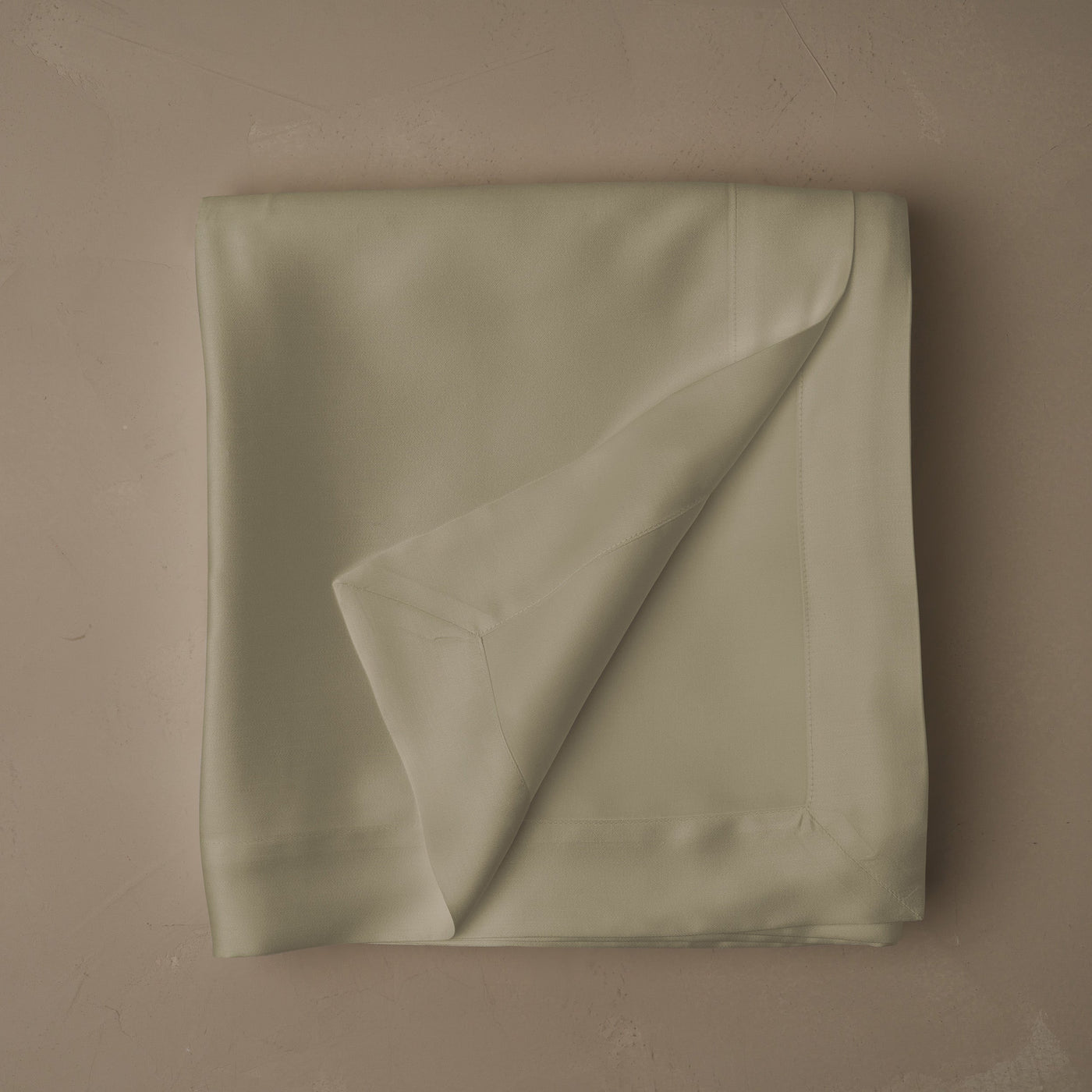 Smooth and silky LETTO Woodland Silk beechwood modal flat sheet in color pistachio, made in Italy