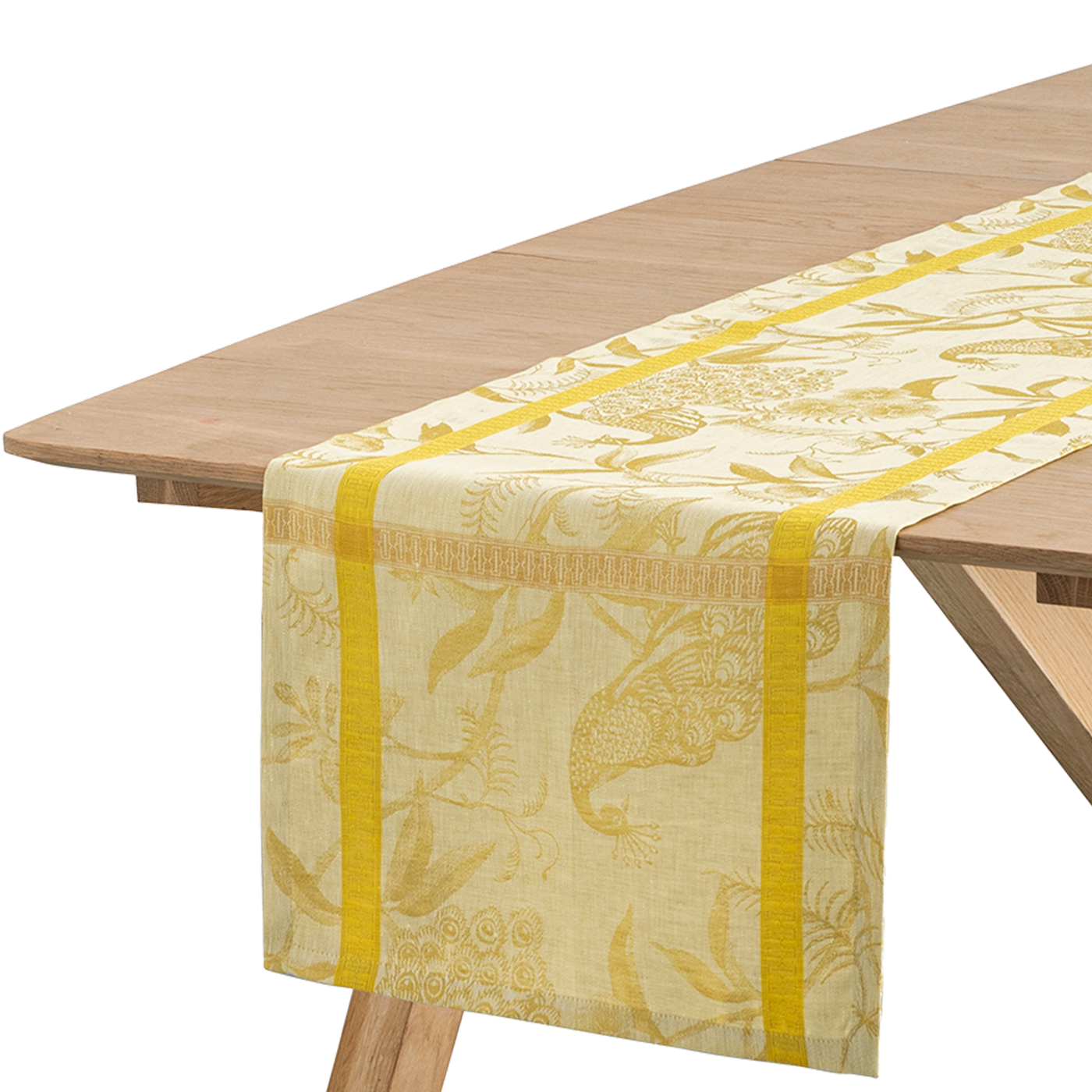 Close-up of À L'Orangerie runner's citrine botanical jacquard pattern with golden stripe border.