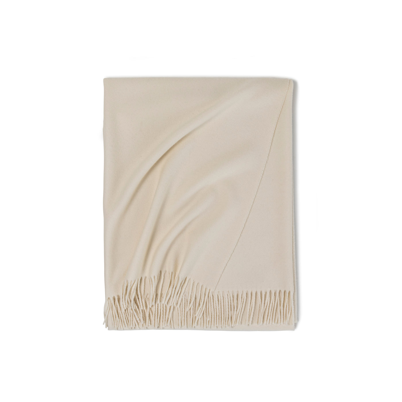 The Pure Cashmere Throw by Frette, in a cream hue with fringed edges, is neatly folded and displayed on a white background. Made in Italy.