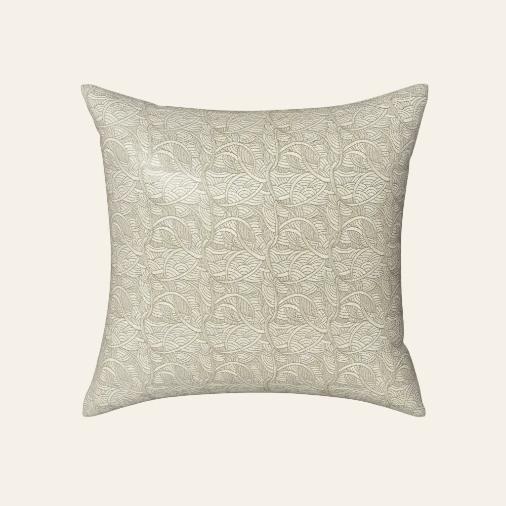 Ann Gish La Sirene pillow in ivory with tonal embroidered wave and fan pattern.