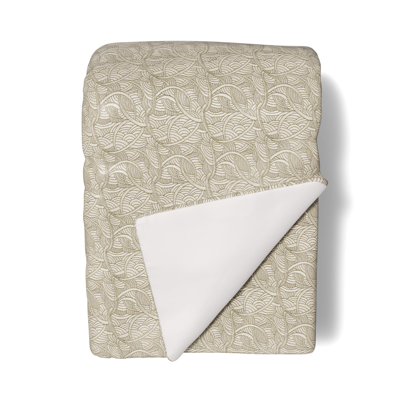Corner fold showing ivory reverse of Ann Gish La Sirene throw with sage leaf jacquard.
