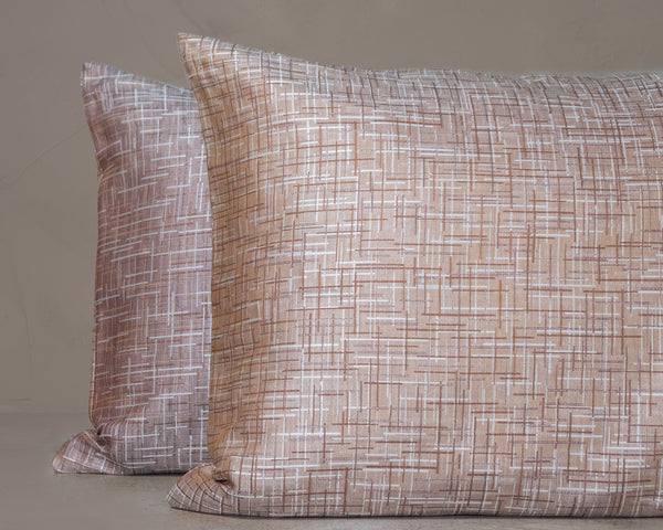 Photo of the Mosaico Jacquard | Pillow Sham ensemble.