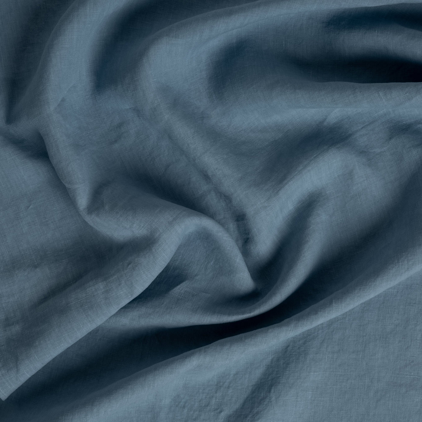 Close-up of Bella Notte Frida guest towel in Tahoe Blue, showing softly draped linen weave.