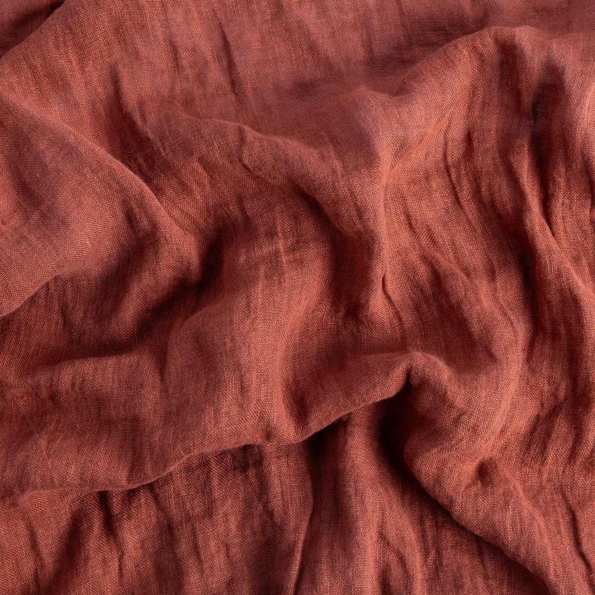 Close-up of Bella Notte Linen Whisper guest towel in Autumn, showing relaxed linen weave texture.
