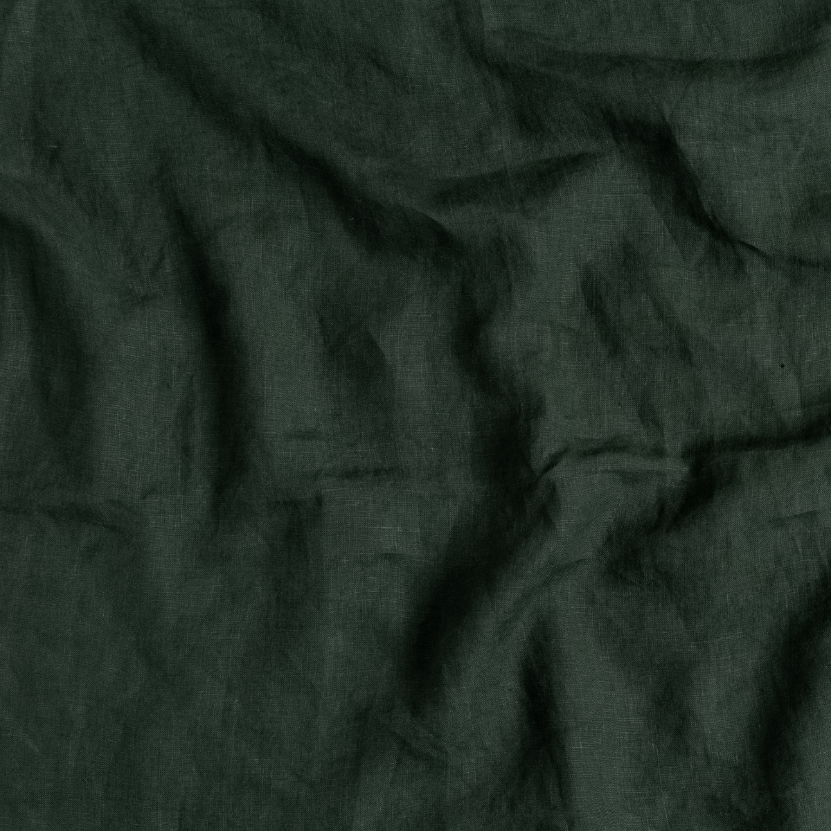 Close-up of Juniper linen pillowcase fabric showing natural wrinkled texture.