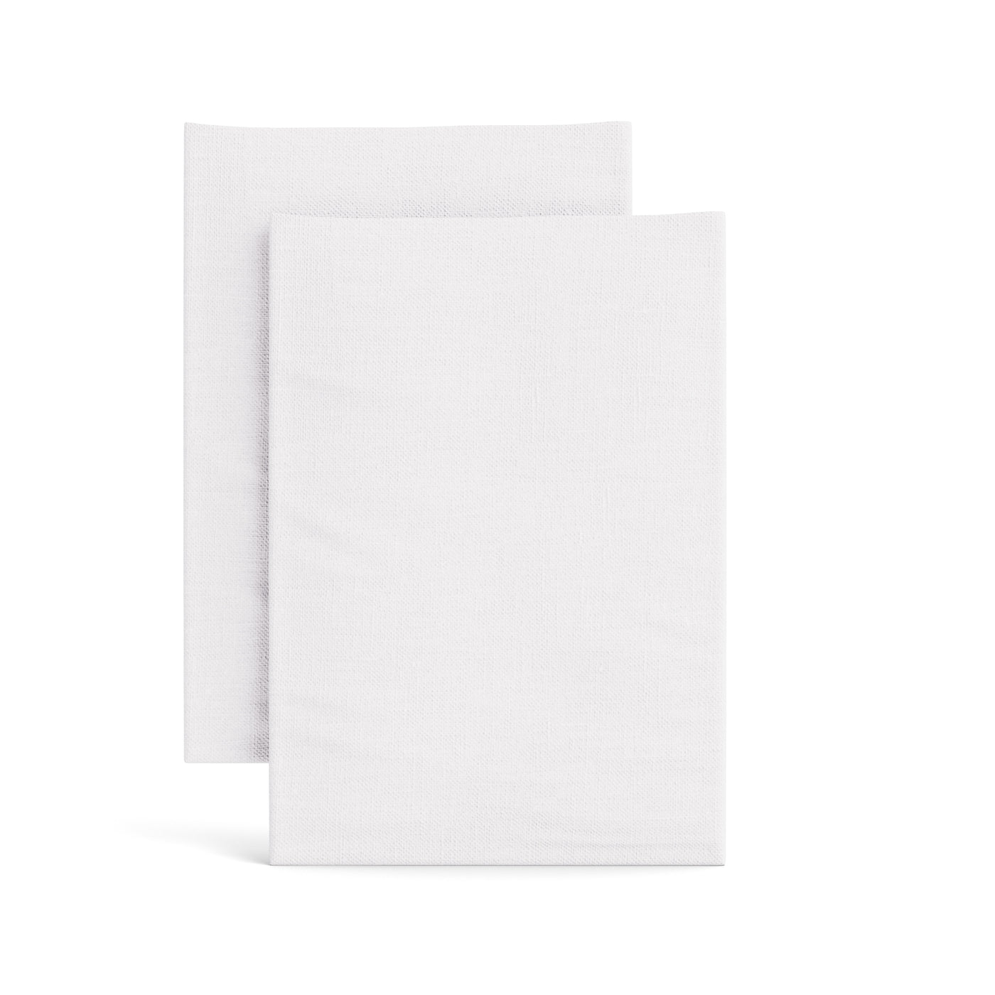 Two white Ann Gish linen pillowcases stacked slightly offset on white background.